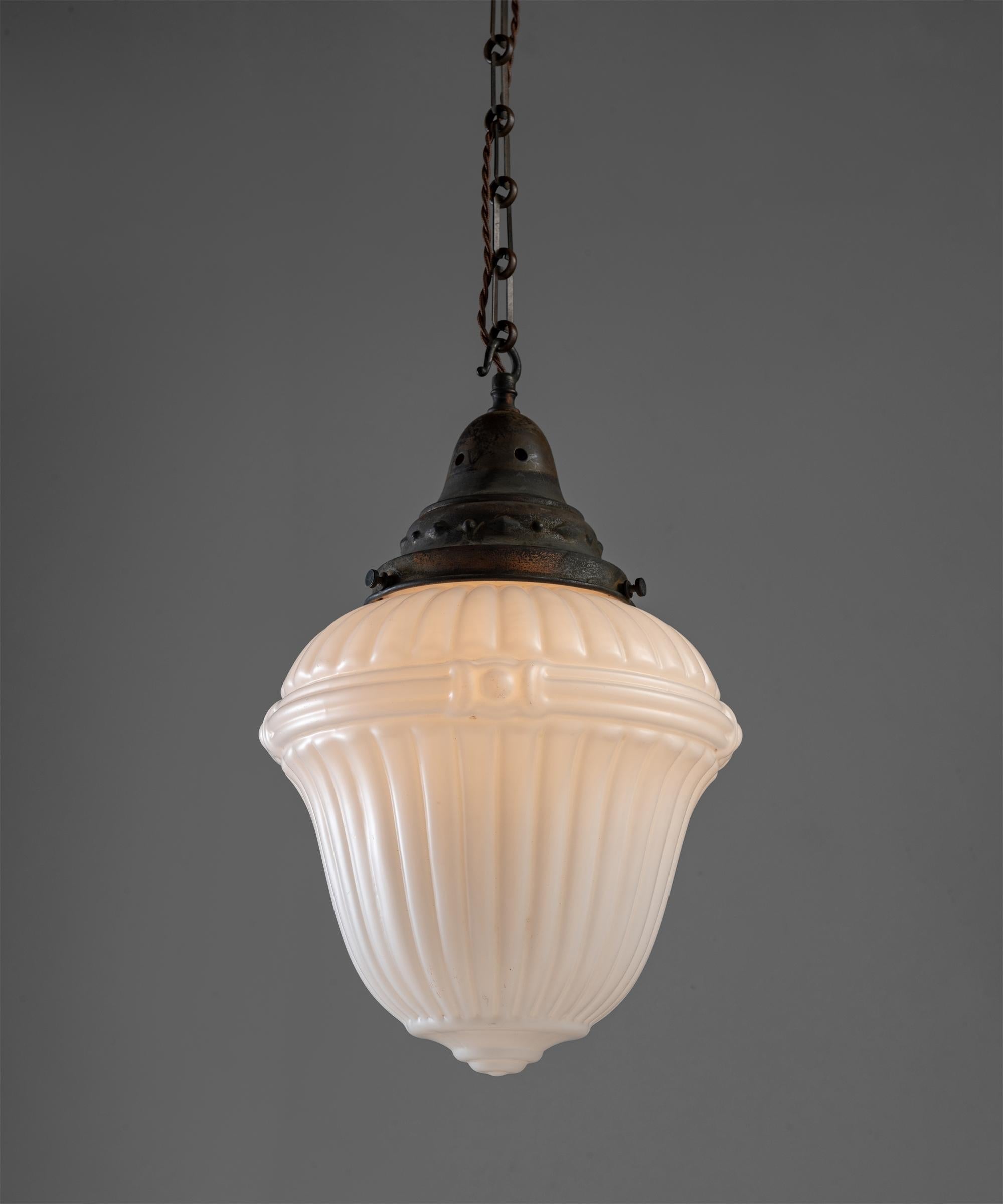 Matte opaline glass pendant, England, circa 1900

Decorative moulded opaline shade with beautifully worn fitter.
