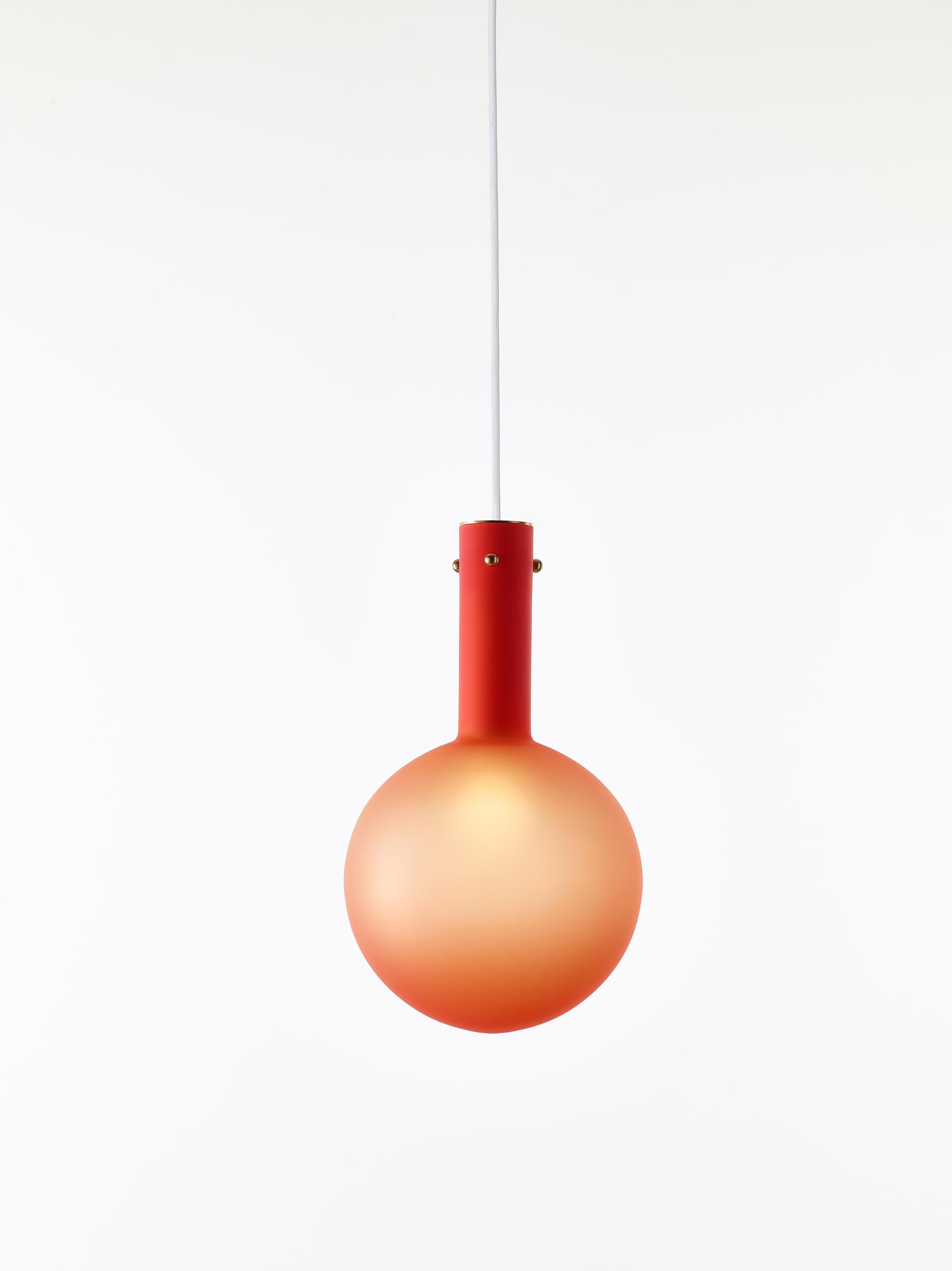 Matte red Sphaerae pendant light by Dechem Studio
Dimensions: D 20 x H 180 cm
Materials: Brass, metal, glass.
Also available: Different finishes and colours available

Only one homogenous piece of hand-blown glass creates the main body of