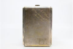 Matte silver case with Batalha Monastery relief and gold interior
