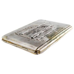 Matte silver case with Batalha Monastery relief and gold interior
