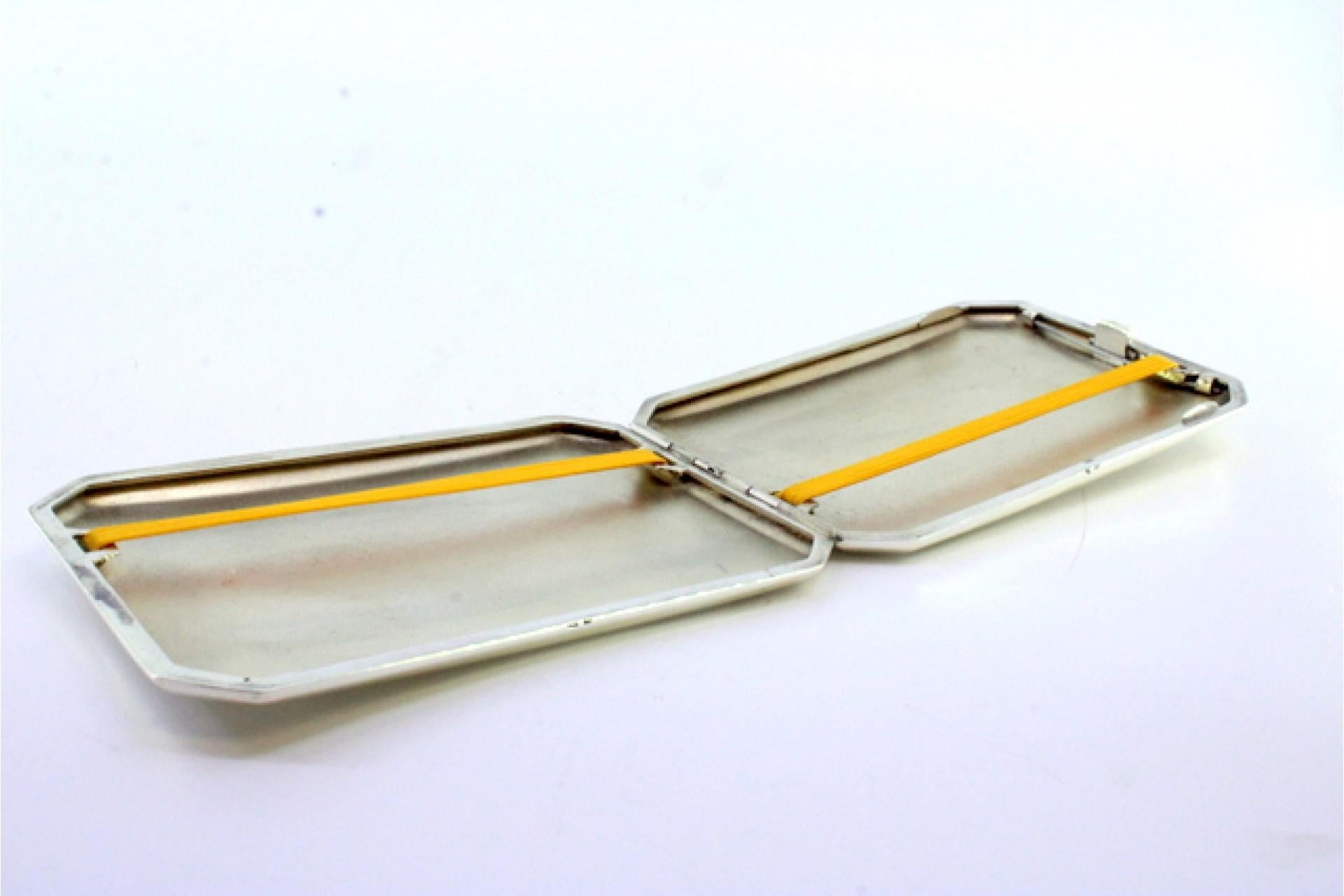 European Matte silver case with beveled corners, friezes and gold interior For Sale