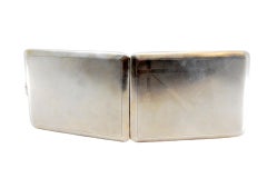 Matte silver cigarette case with crossed bands, gold interior and hinged lid