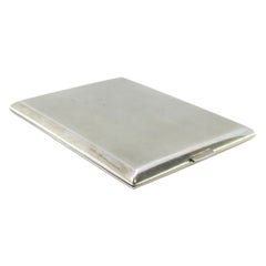 Matte silver cigarette case with smooth trim and gold interior