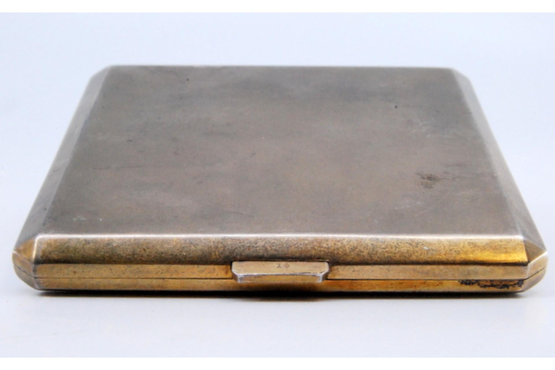 Description: Matte silver toiletry box with mirror and gold interior. Metal: Silver. Origin: Portuguese. Brand: Cabeça de escravo. Weight: 130.80 grams. Dimensions: 7.5x7.5cm. Content: 833/1000. Assay Mark: Yes, between 1938 and 1984. Additional