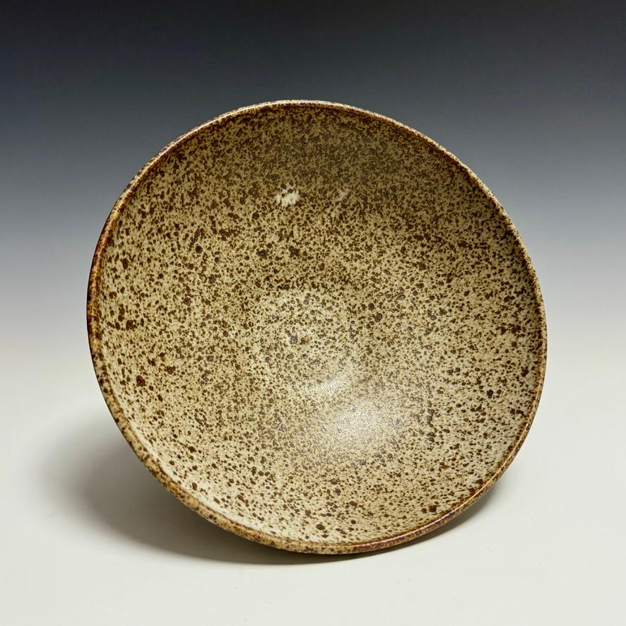 Matte White Speckled Bowl by Jason Fox.

A Southern Californian for over half his life, Contemporary Ceramic Artist Jason Fox draws upon his classical education in Architecture and Art History as well as his love of surfing and the ocean. He works