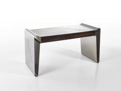 Incisione decorativa in acciaio inox opaco Lato superiore Cassetti anteriori in ebano Macassar