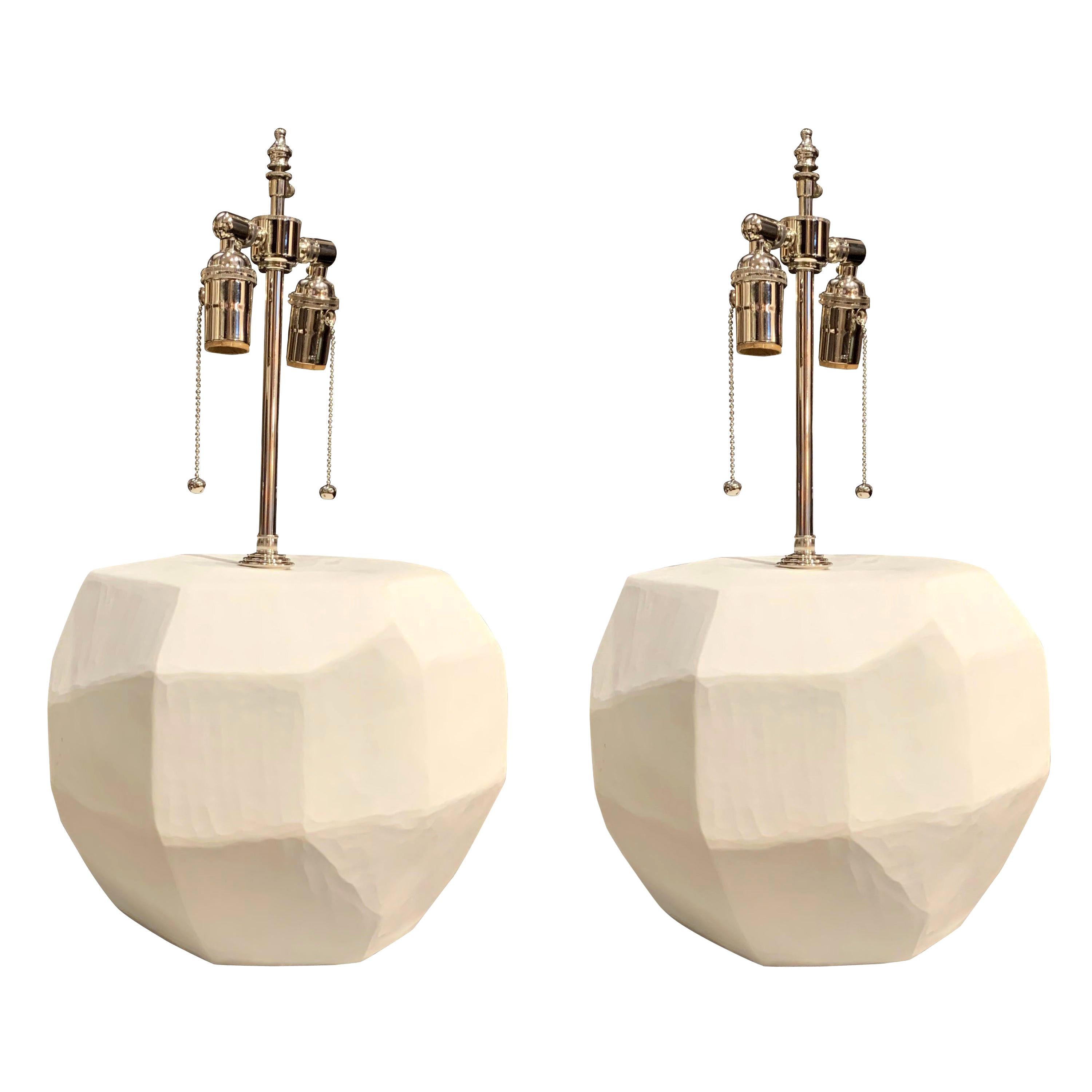 Contemporary Romanian matte white glass pair of lamps with cubist decorative shape.
The lamps are newly wired with two sockets.
Measures: Base diameter 11
