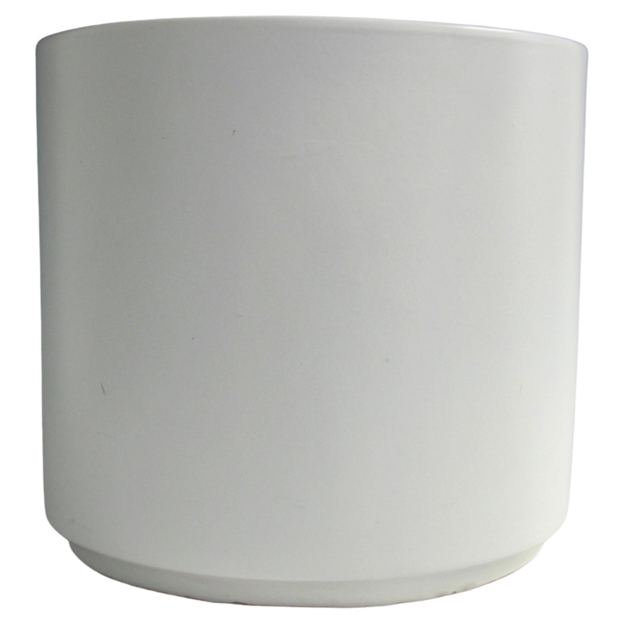 A serene and individual semi-matte white glazed terra cotta planter pot. Minimalist in form with functional use.
Good condition, consistent with age and use.