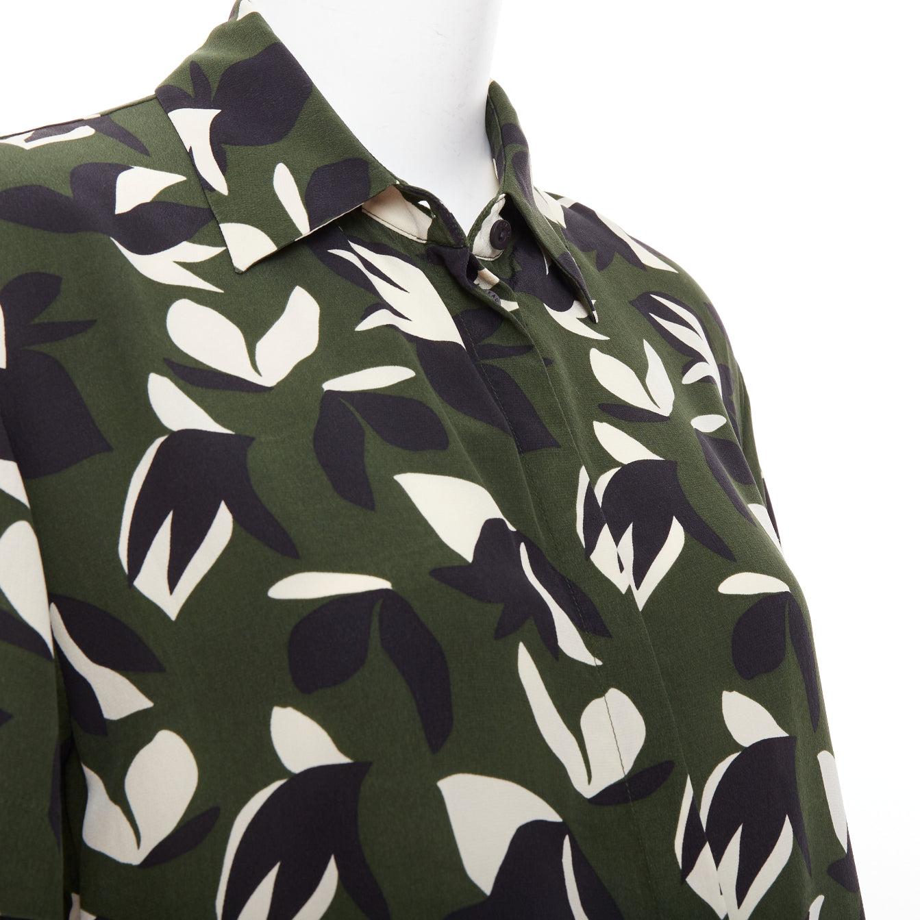 MATTEAU  100% silk  green black geometric print shirt pant set UK6 XS
Reference: YIKK/A00290
Brand: Matteau
Material: Silk
Color: Green, Black
Pattern: Camouflage
Closure: Button
Made in: China

CONDITION:
Condition: Excellent, this item was