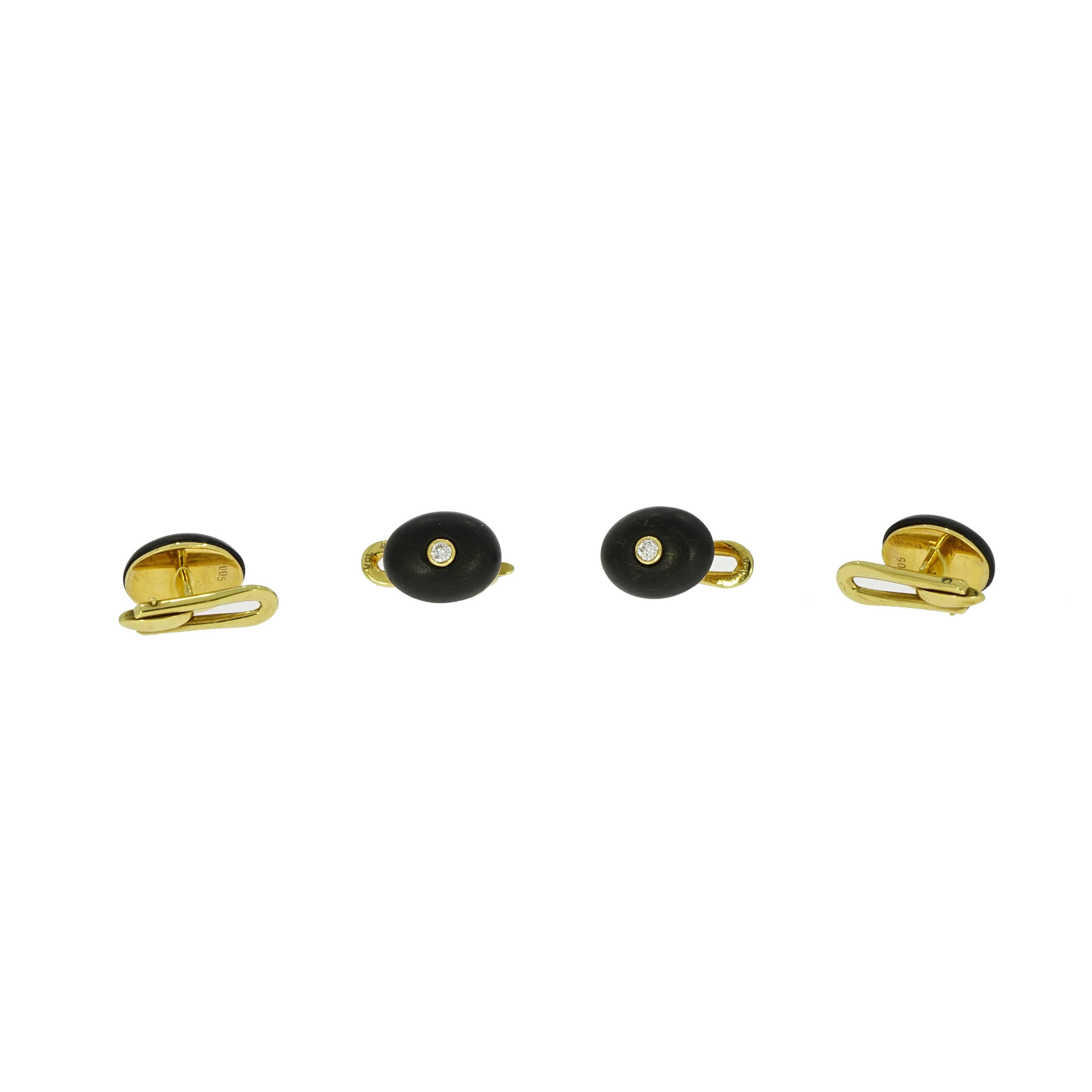 Men are often intrigue by precious gems, and one of the ways that they can wear them are in tastefully done accessories. These set of 4 formal dress-stud is handcrafted in 18k yellow gold with a matte finished oval onyx, showcasing a brilliant round