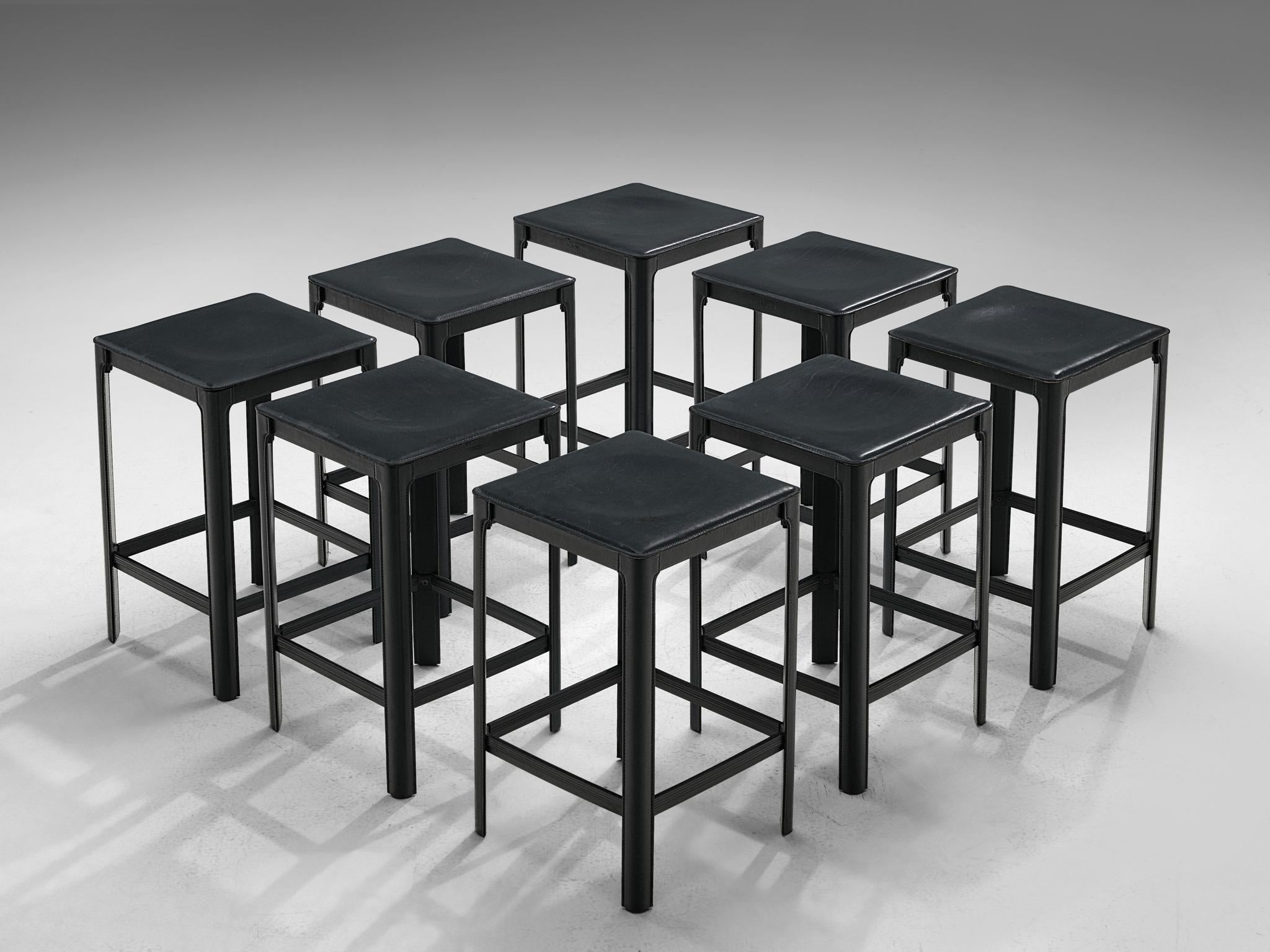 Matteograssi, bar stools, leather, metal, Italy, 1970s

Postmodern set of stools in black leather, designed by Matteo Grassi. The stools are completely covered in leather, which is stitched and molded on to the metal frame, a type of architectural