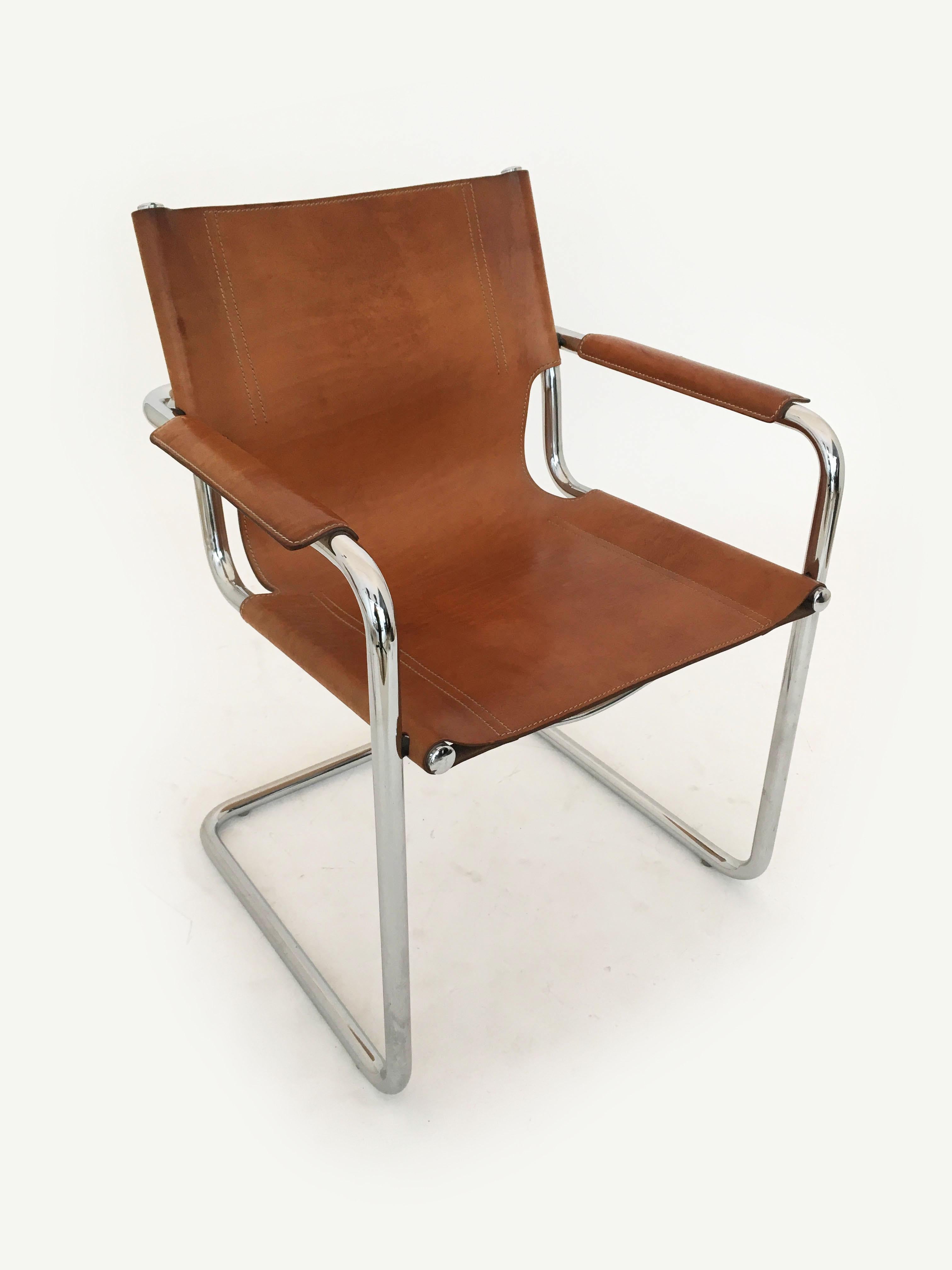 Stylish Matteo Grassi cantilever chrome and cognac leather Visitor side chairs, Italy, 1970s. The brilliant chrome and the rugged cognac leather shows beautifully. Unapologetic masculine in style on first sight, this pair will be equally stylish if