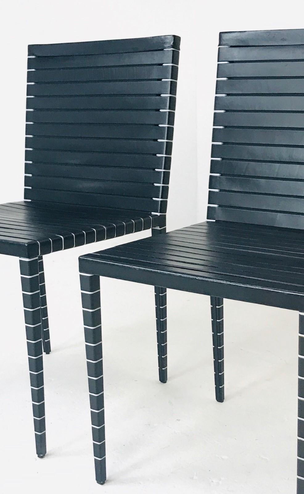 Set of MM by Matteo Grassi chairs have aluminum frame entirely wrapped in fine strips of leather in a way that is reminiscent of the wrappings of Egyptian mummies. MM offers the user the comfort of great suppleness. Designed by Jean Nouvel. 

   