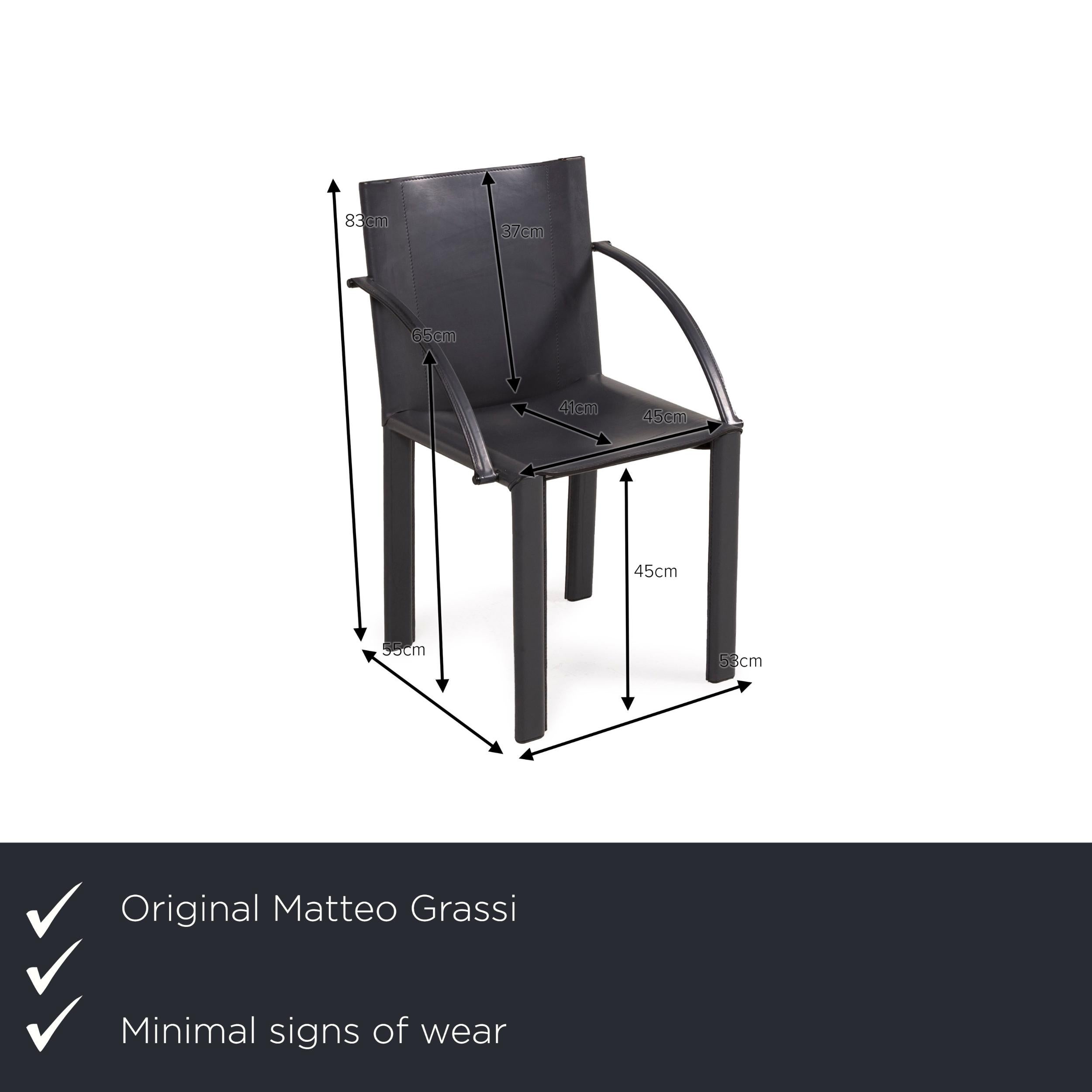 We present to you a Matteo Grassi leather chair black vintage armchair.


 Product measurements in centimeters:
 

Depth: 55
Width: 53
Height: 83
Seat height: 45
Rest height: 64
Seat depth: 41
Seat width: 45
Back height: 37.
 