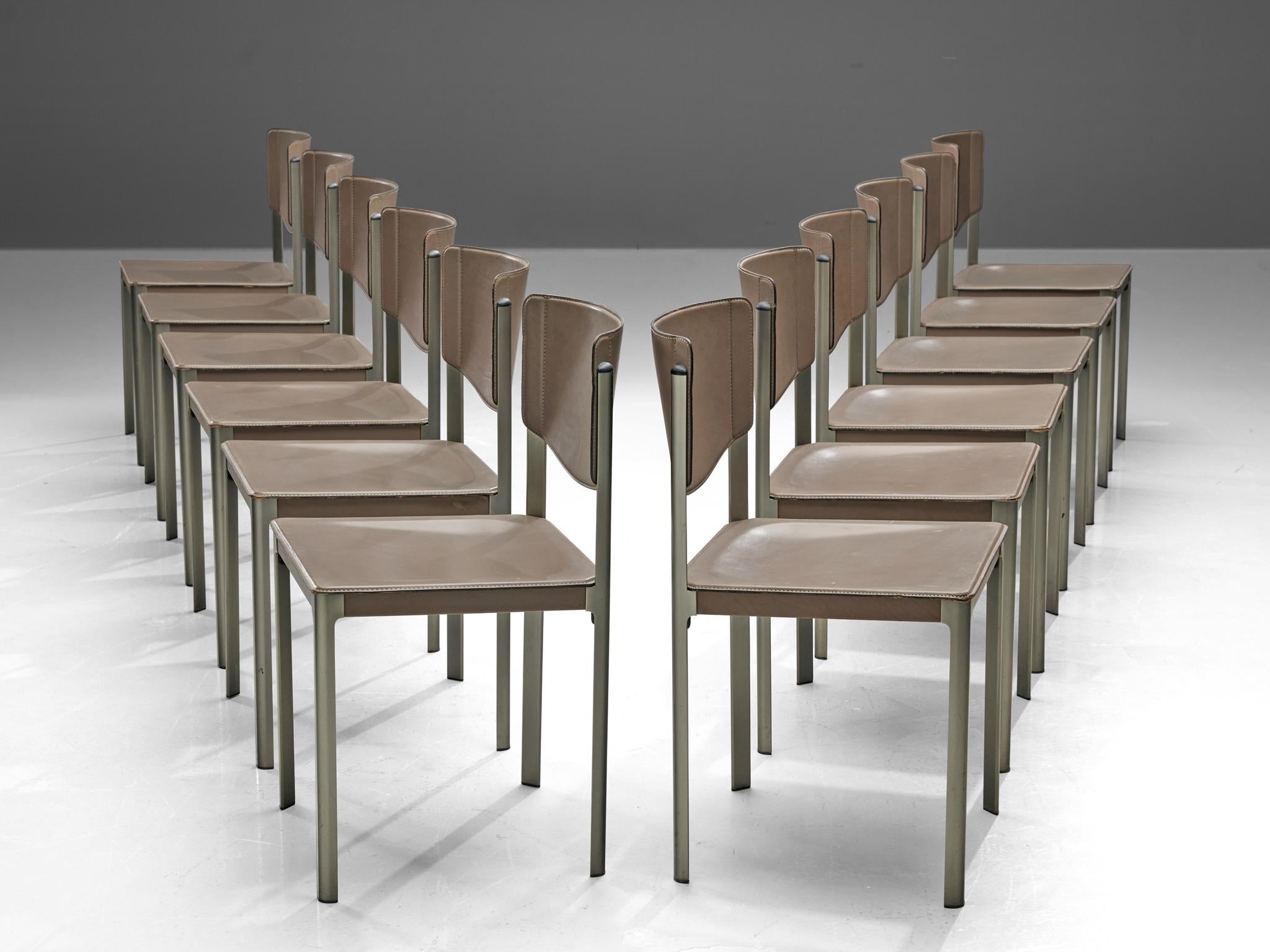 Matteo Grassi, set of twelve dining chairs, leather, steel, Italy, 1980s

These sophisticated grey leather chairs by Matteo Grassi feature a cubic design. The seat and base are upholstered in leather, leaving the metal frame bare. The leather is in