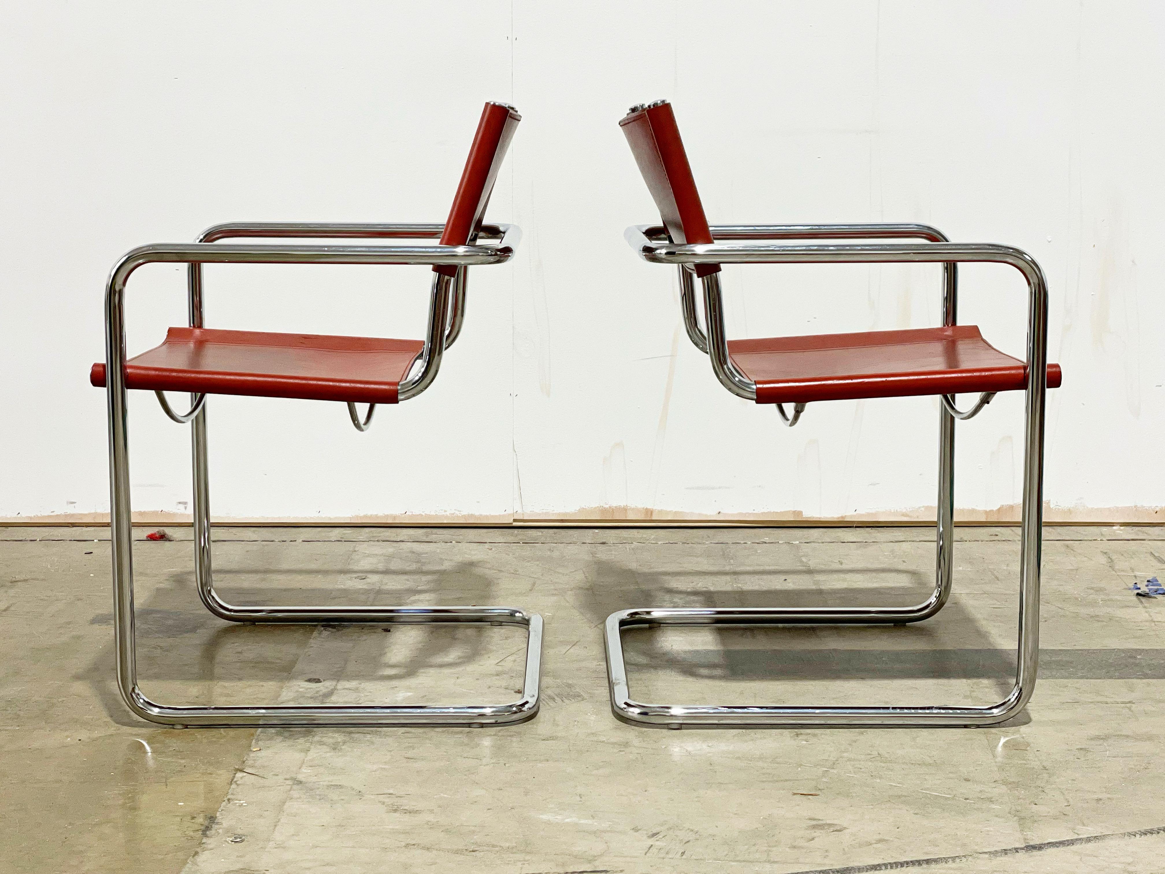 Cantilevered armchairs by Matteo Grassi, Italy circa 1980. Tubular chromed steel and cognac leather. Embossed makers mark on both chairs.
Chrome is in excellent condition, no pitting. Cognac leather has aged to perfection, it is soft and supple and