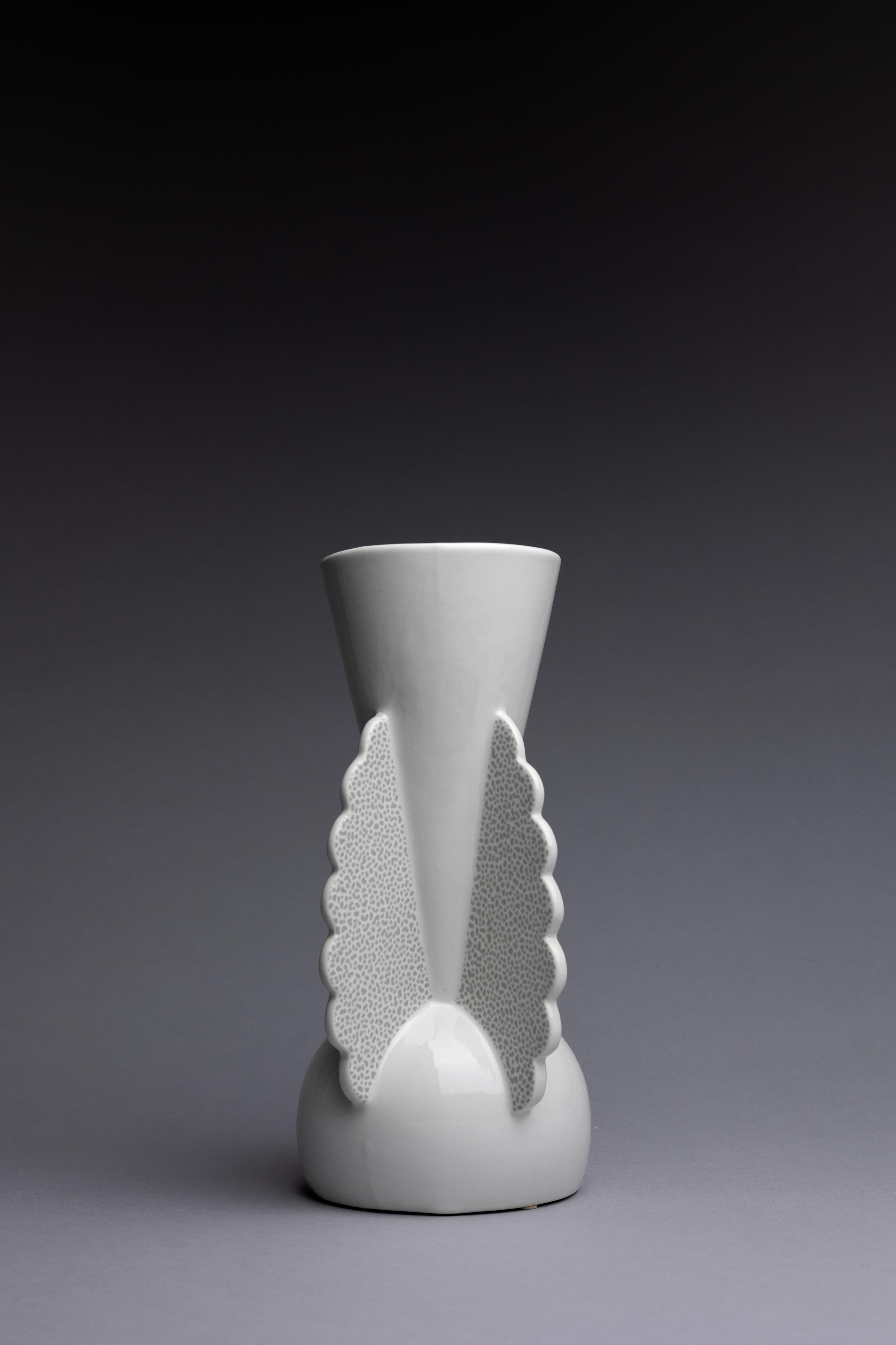 This Matteo Thun Vase was created in the 1980s Memphis style. The porcelain vase’s exaggerated size and details point to the movement’s irreverence for traditional, or even functional, design.

The Memphis Group’s playful approach to design is