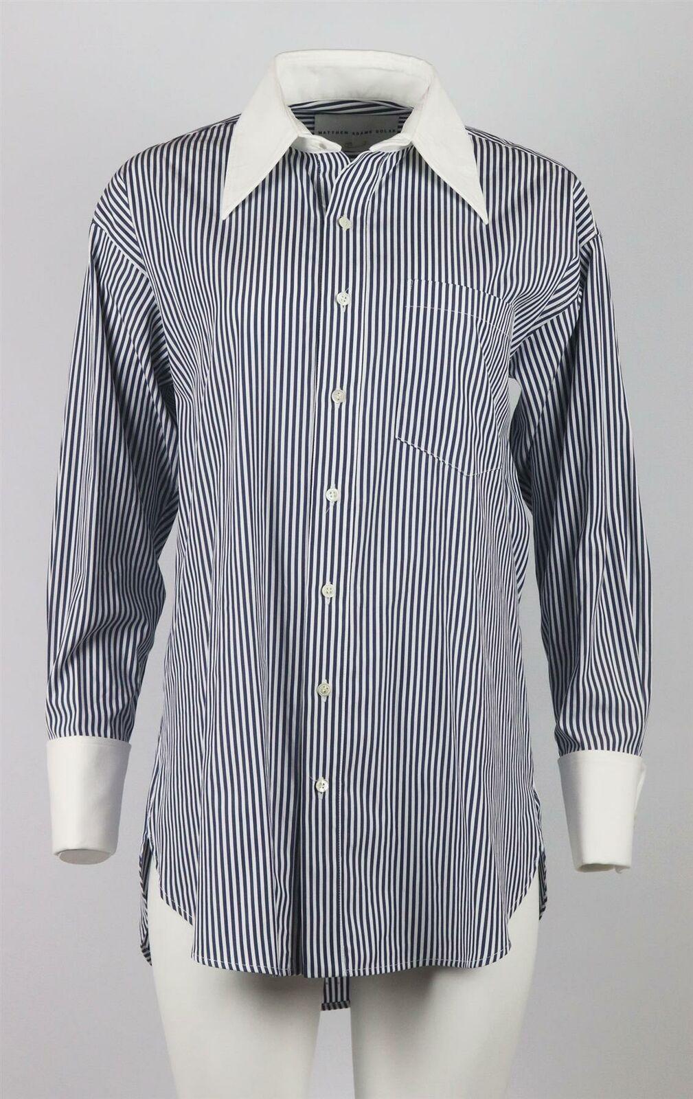 This navy and white Matthew Adams Dolan oversized shirt features a bold embroidered detail in the designers initials at the back, its cut from blue and white striped cotton poplin with bold white collar and cuffs.
Button fastening at front.
100%