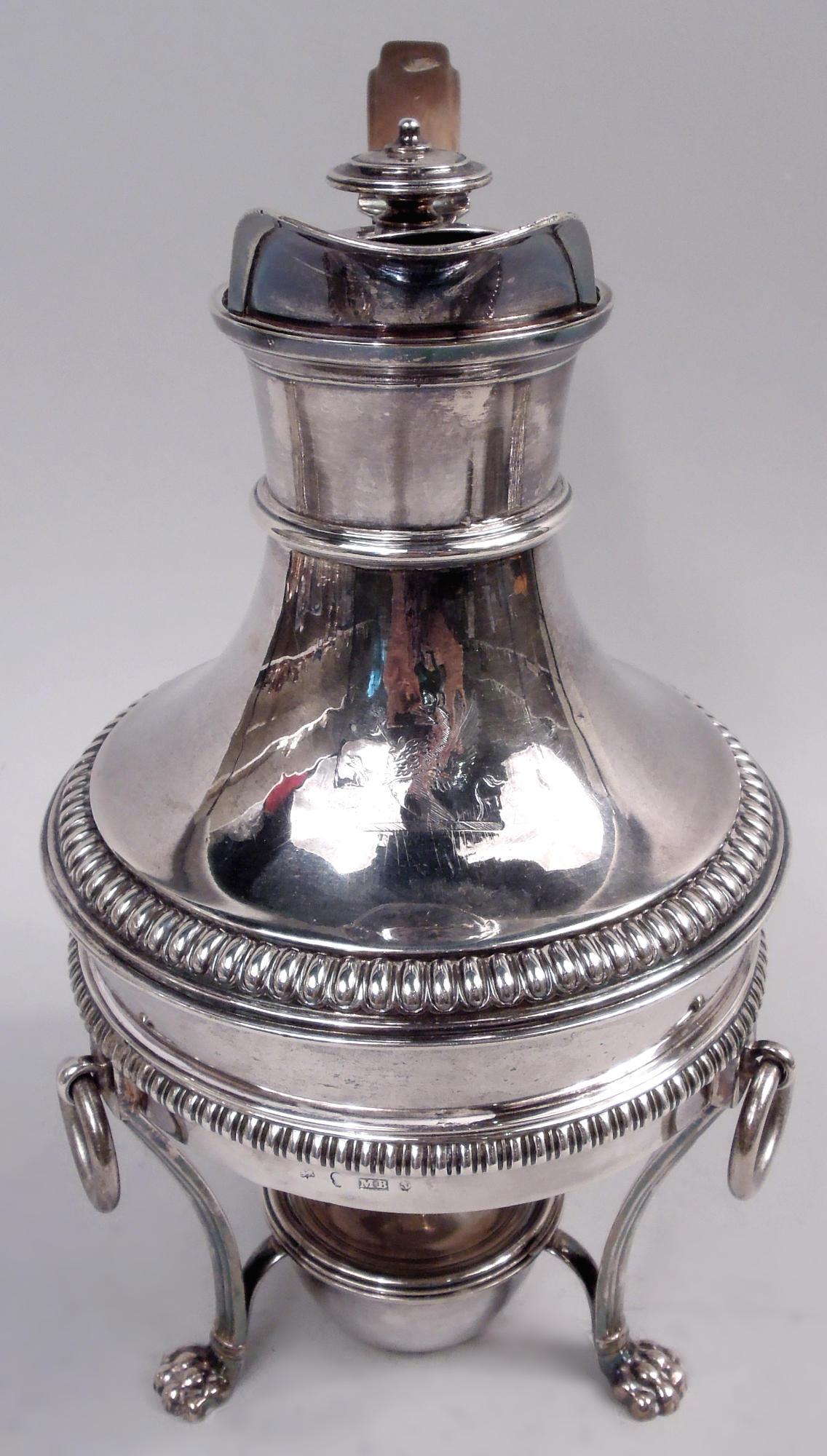 Georgian Neoclassical sterling silver biggin coffeepot, 1807-1809. Coffeepot: Wide and curved bowl and upward tapering neck. Helmet mouth and hinged domed cover with round stepped finial; stained-wood high-looping handle in volute-scroll silver