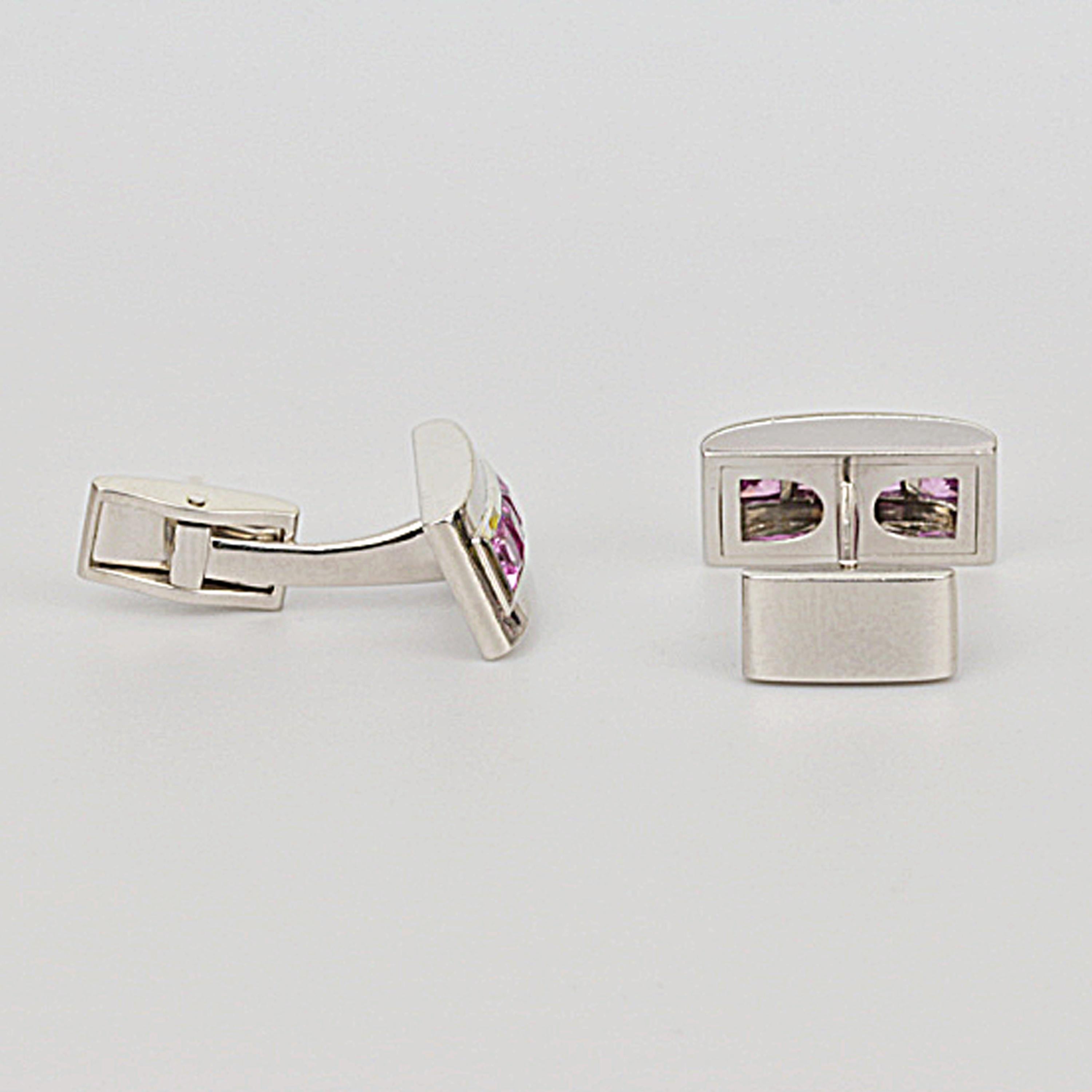 Matthew Cambery 18K white gold cufflinks set with a strip of princess cut pink sapphires. The total weight of the pink sapphires is 2.70ct. T bar fitting.

