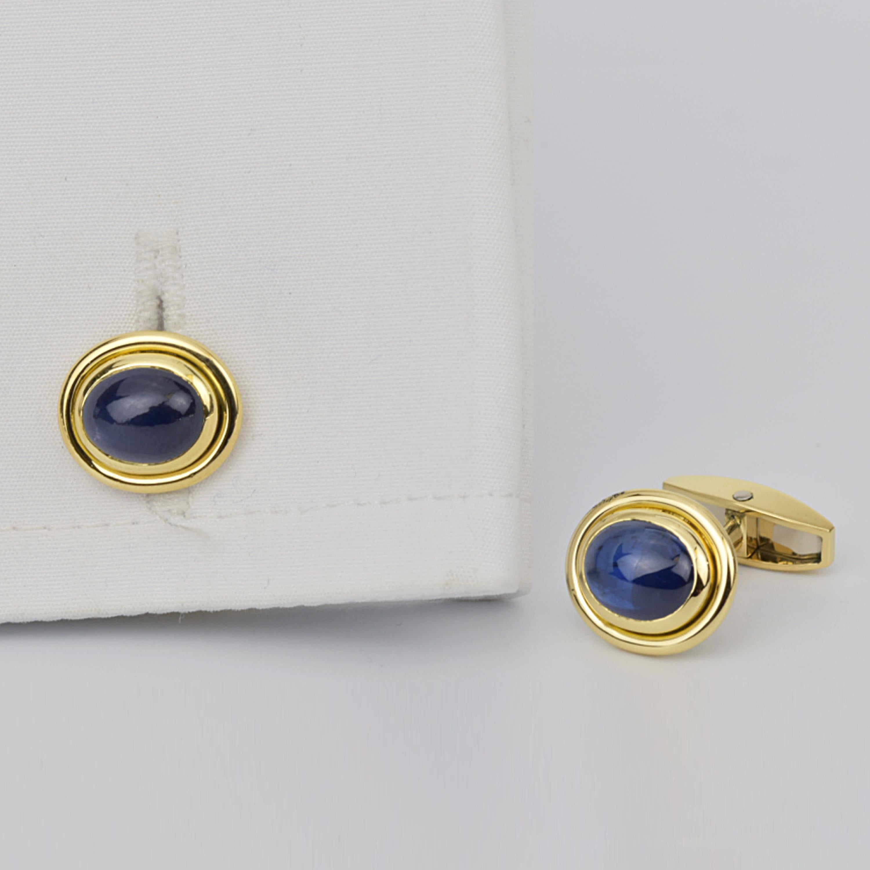 Matthew Cambery 18K Yellow Gold Cufflinks set with Oval Cabochon Sapphires. T Bar Fitting.

