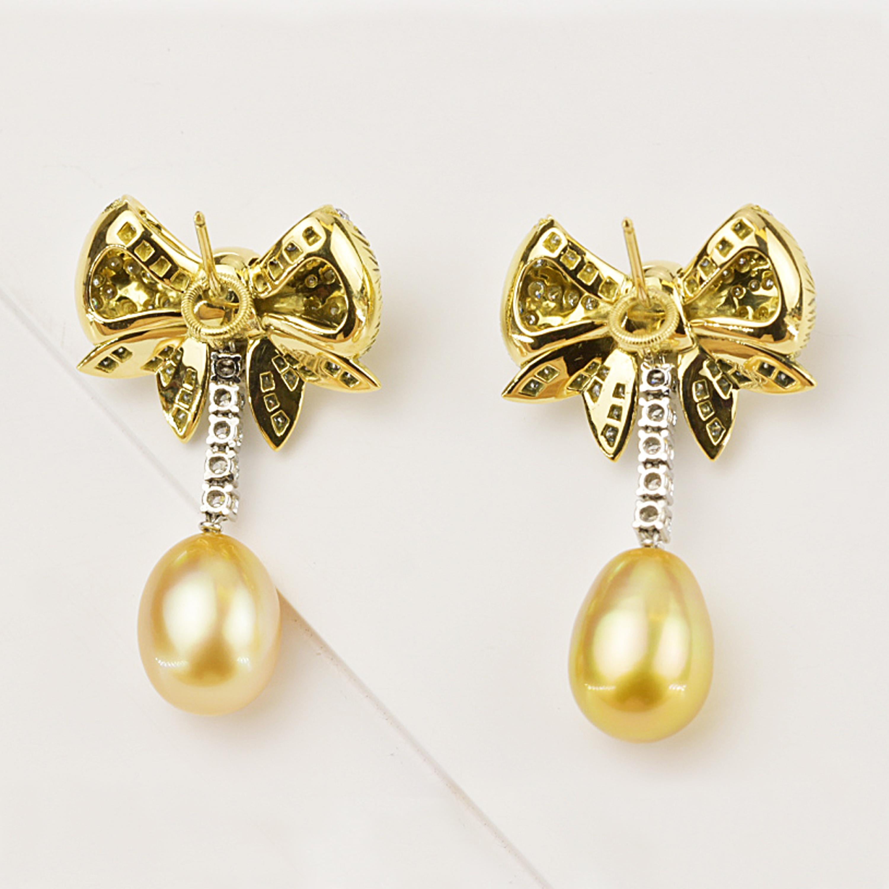 gold bow earrings with pearl