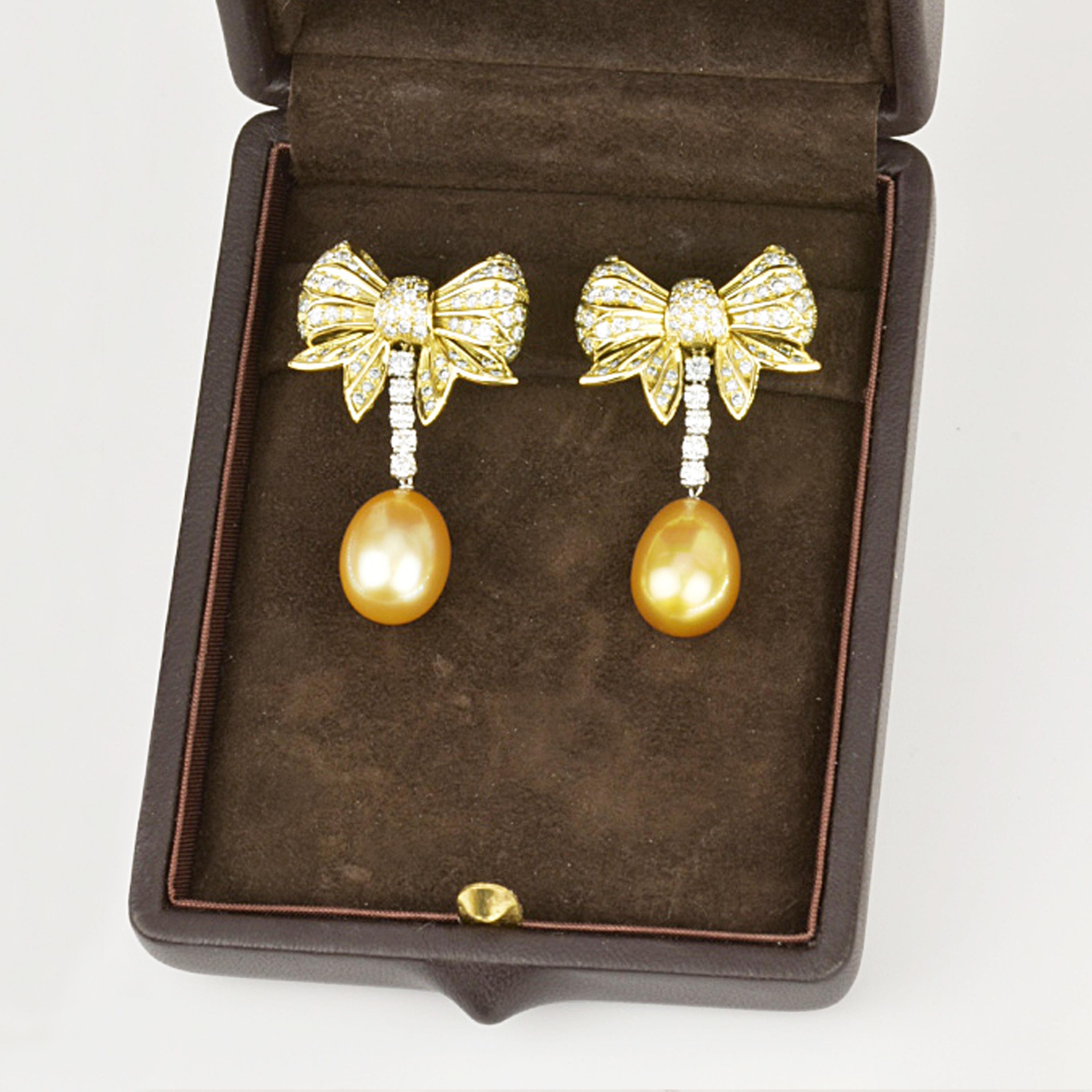 Contemporary Matthew Cambery 18 Karat Gold Platinum Diamond Bow Earrings South Sea Pearls For Sale