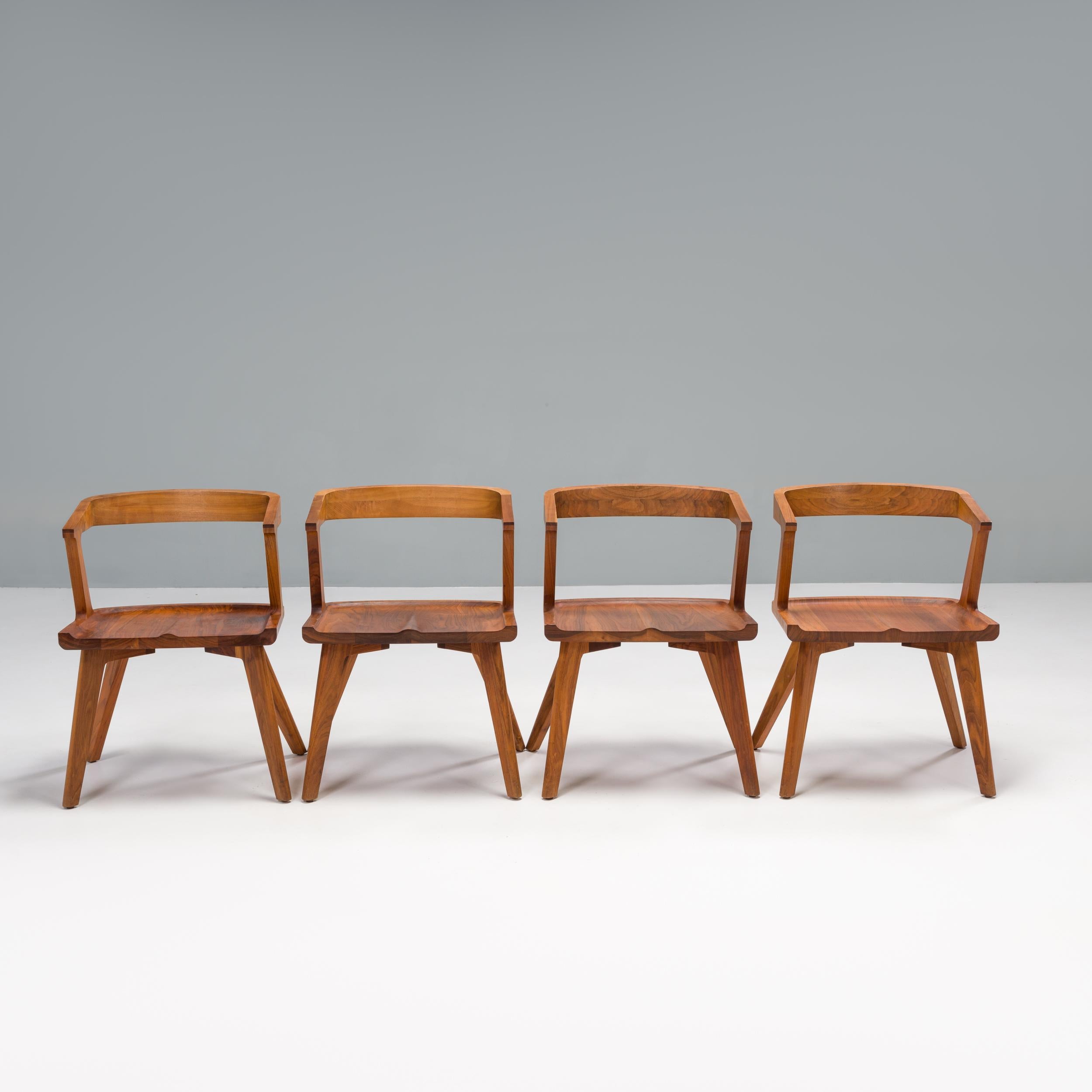 Designed by Matthew Hilton and produced in the De la Espada factory in Portugal, the Colombo dining armchairs are beautifully crafted.

Constructed from Danish oiled walnut, the chairs give the impression they have been carved out, with integrated