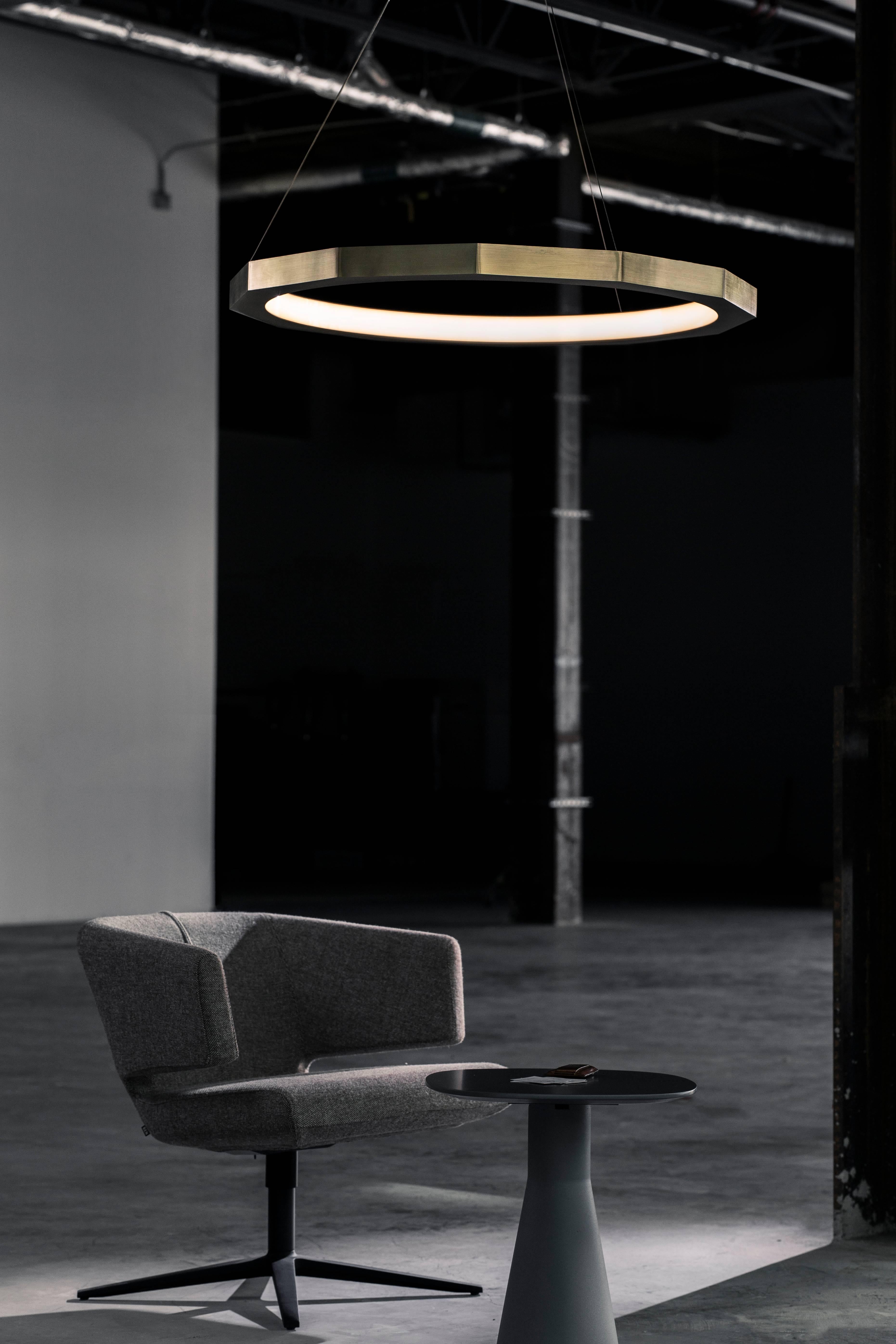 Dodeca, a nod to the Greek word for 12, looks to be forged with its facets that interaction wonderfully with ambient light and yet it is counterintuitive to inner circular illumination in this Matthew McCormick light. Created in refined sizes of 28,