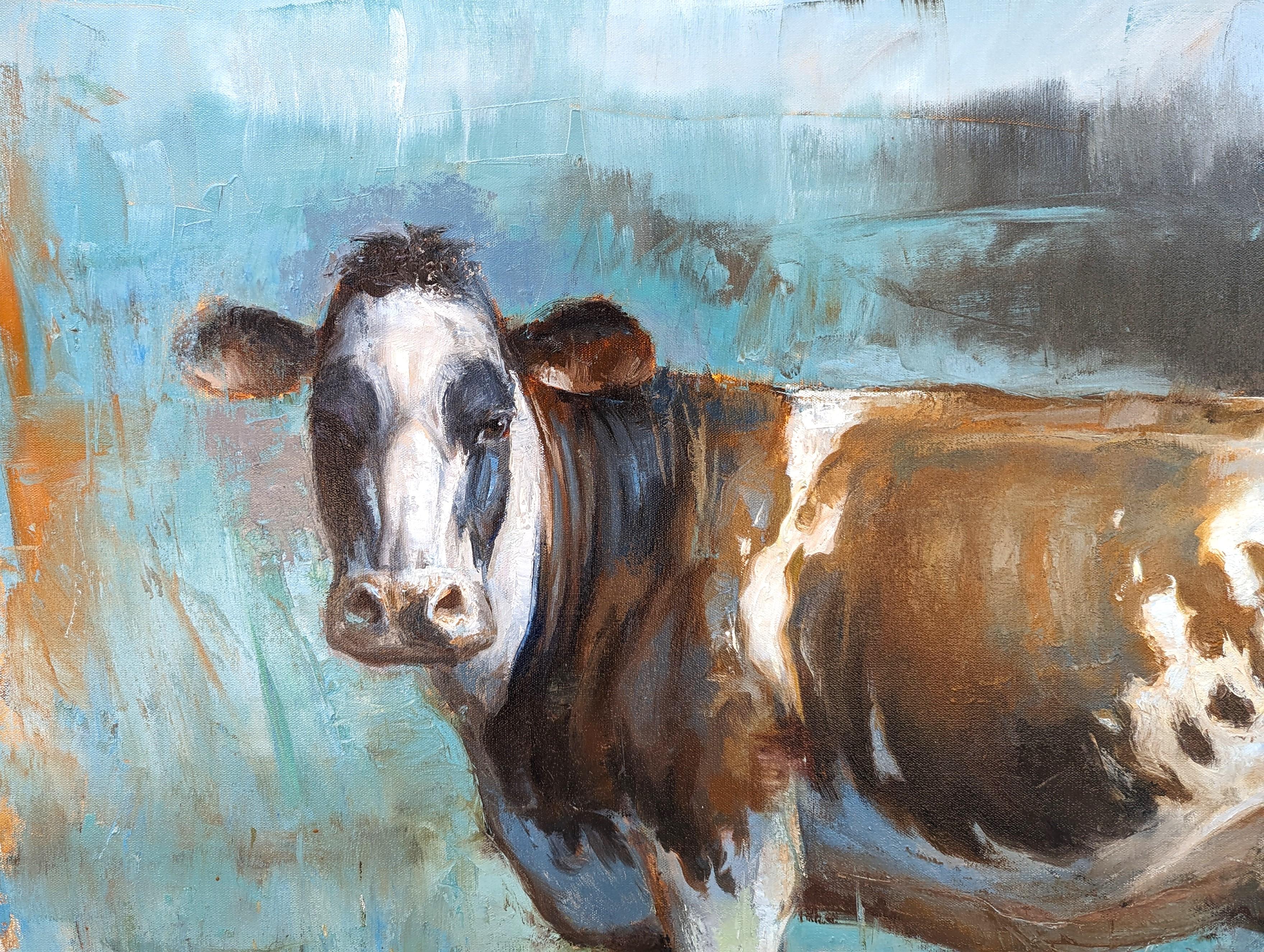 Naturalistic animal painting by contemporary artist Matthew Paoletti. The work features a brown and white spotted cow standing in an abstract green field and set against a blue sky. Signed and dated by the artist in the front lower right corner.