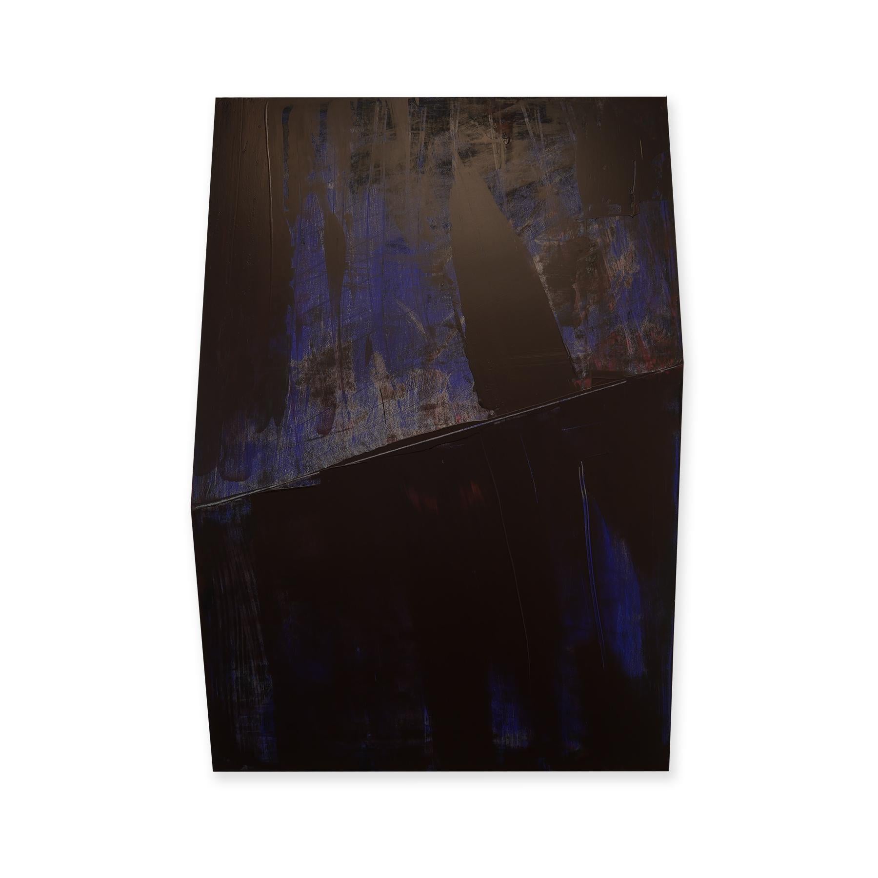 Abstract wall sculpture featuring three dimensional geometric shapes painted with bright blue and black paint. The uniqueness of this blue does not derive from the ultramarine pigment, but rather from the matte, synthetic resin binder in which the