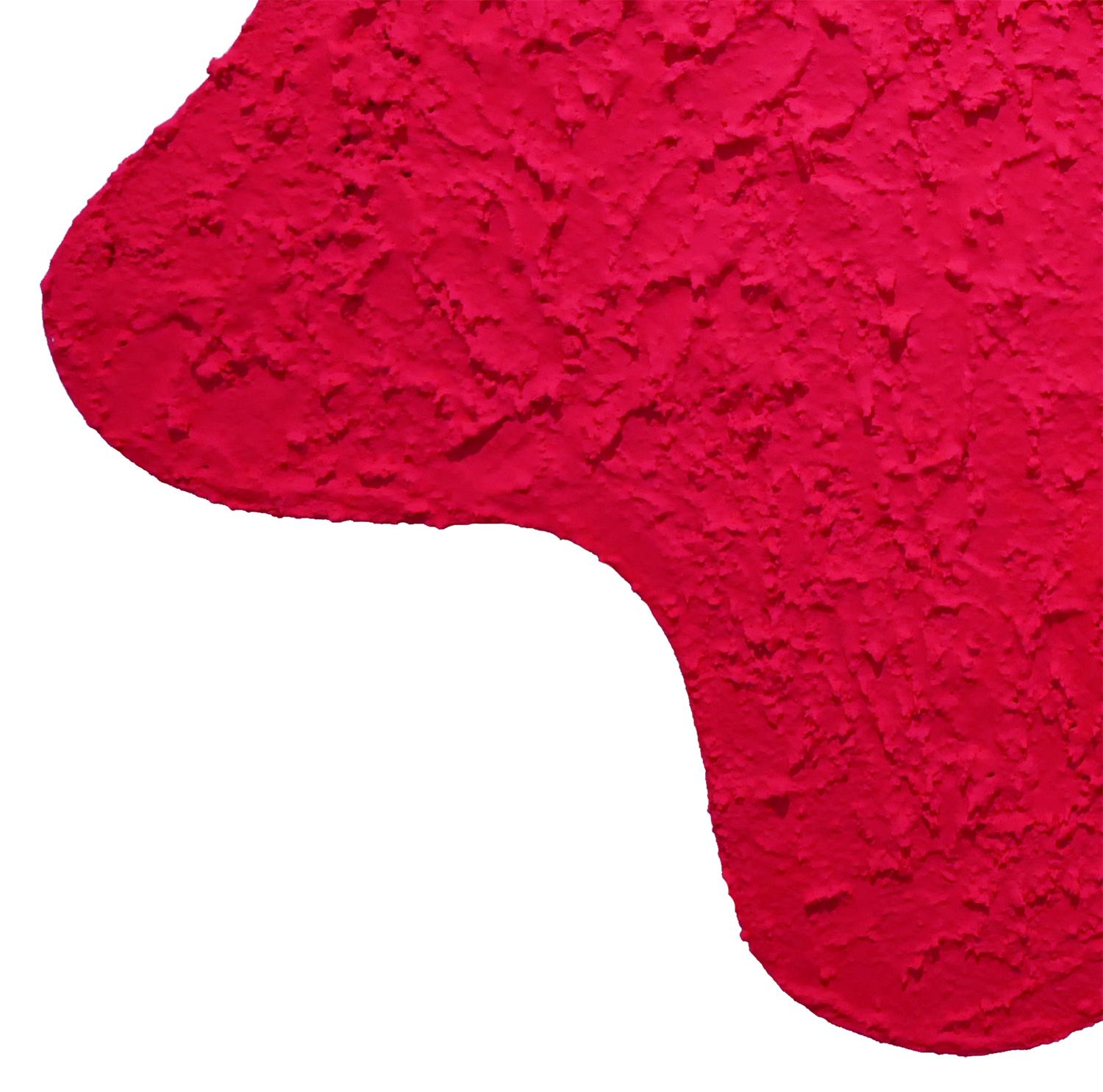 Abstract textured biomorphic shape painted with bright pink pigment by contemporary Houston, TX artist Matthew Reeves. The work is designed to hang away from the wall and cast a shadow around the piece. The dynamic texture combined with the