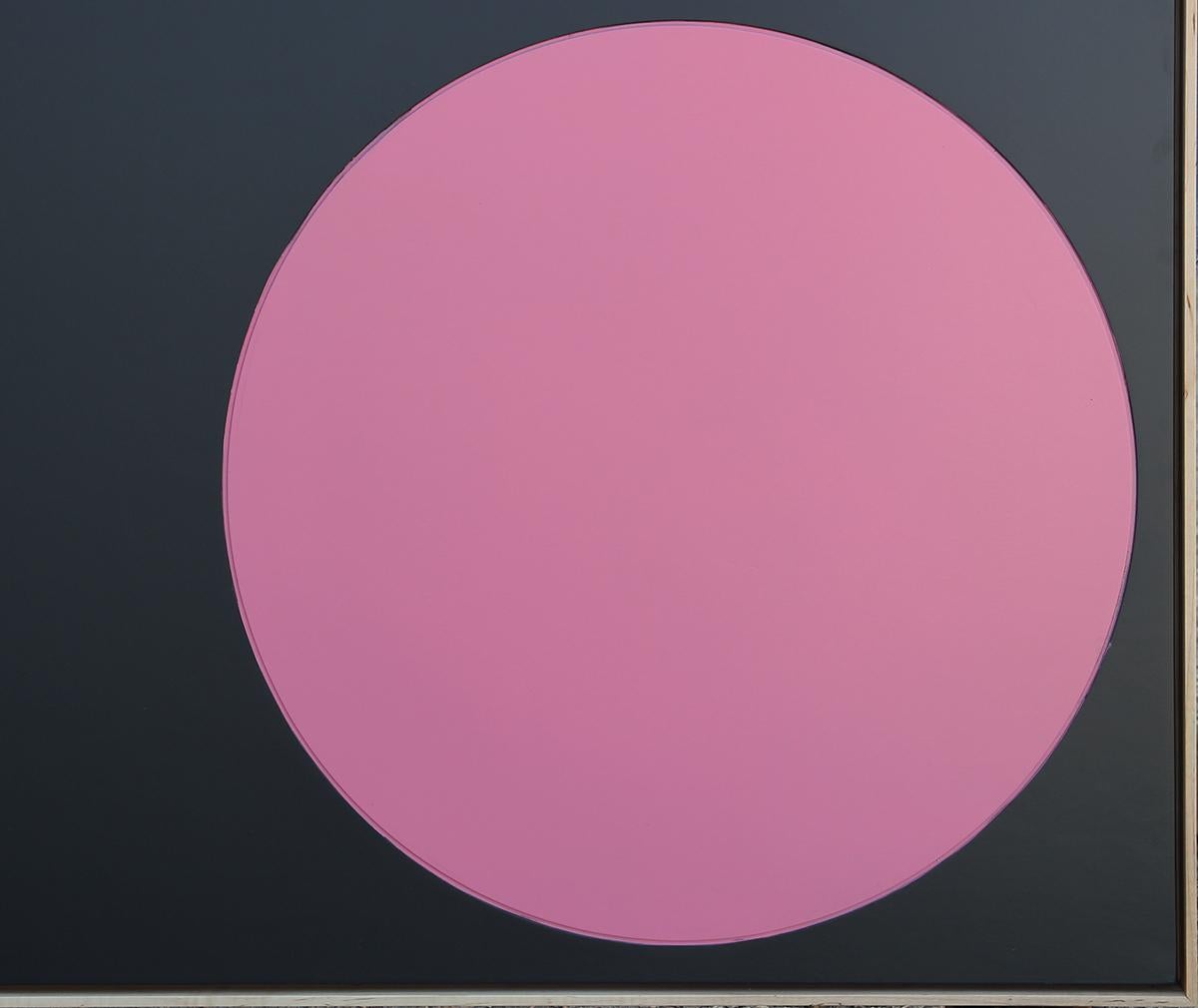 Abstract geometric sculptural painting by Houston, TX artist, Matthew Reeves. This work depicts a green rectangle, blue triangle, and pink circle against a plain black background. Framed in a natural wood floating frame.

Dimensions Without Frame: H