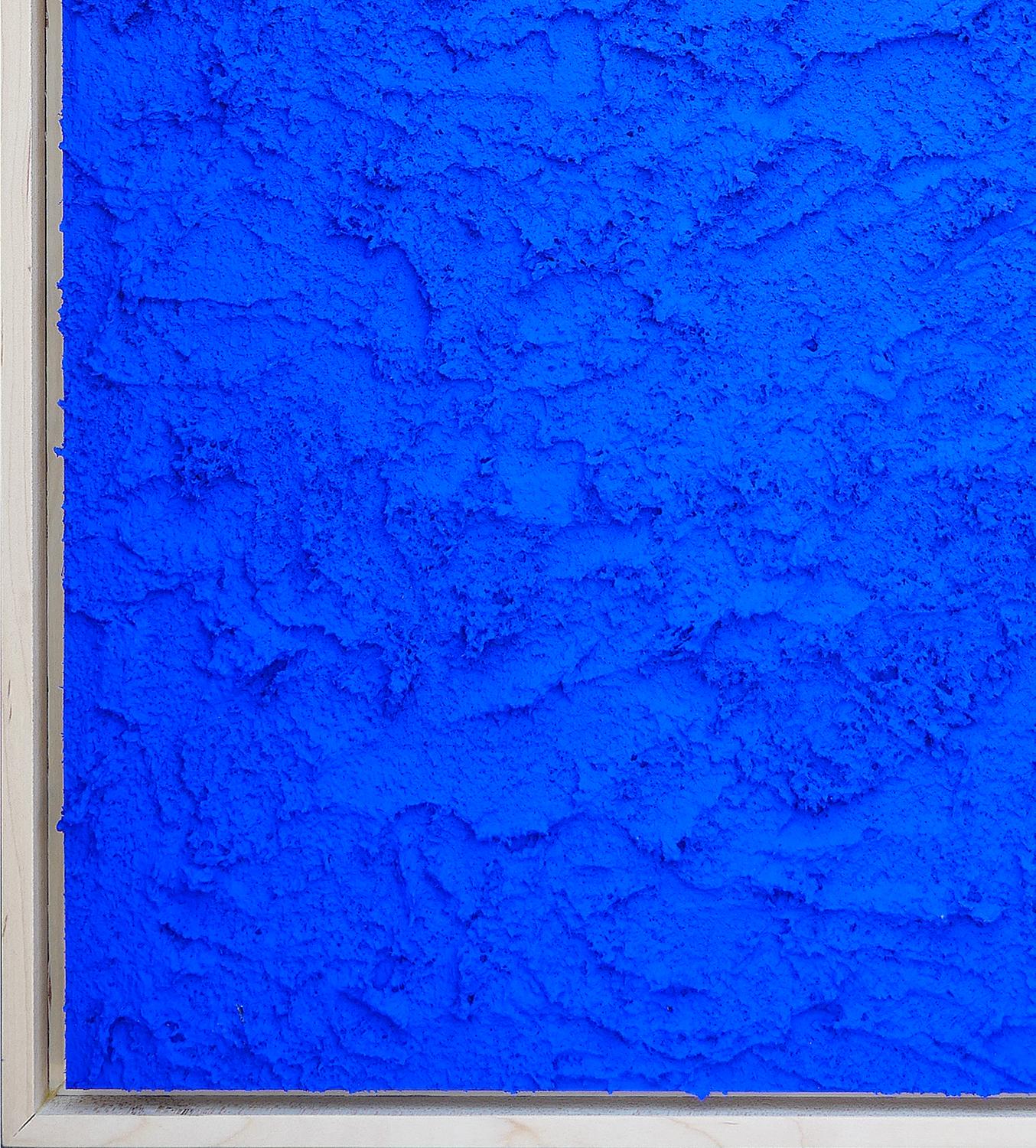 Abstract textured composition painted with bright blue pigment by contemporary Houston, TX artist Matthew Reeves. The dynamic texture combined with the intensity of the blue creates a lively energy. The uniqueness of this blue does not derive from