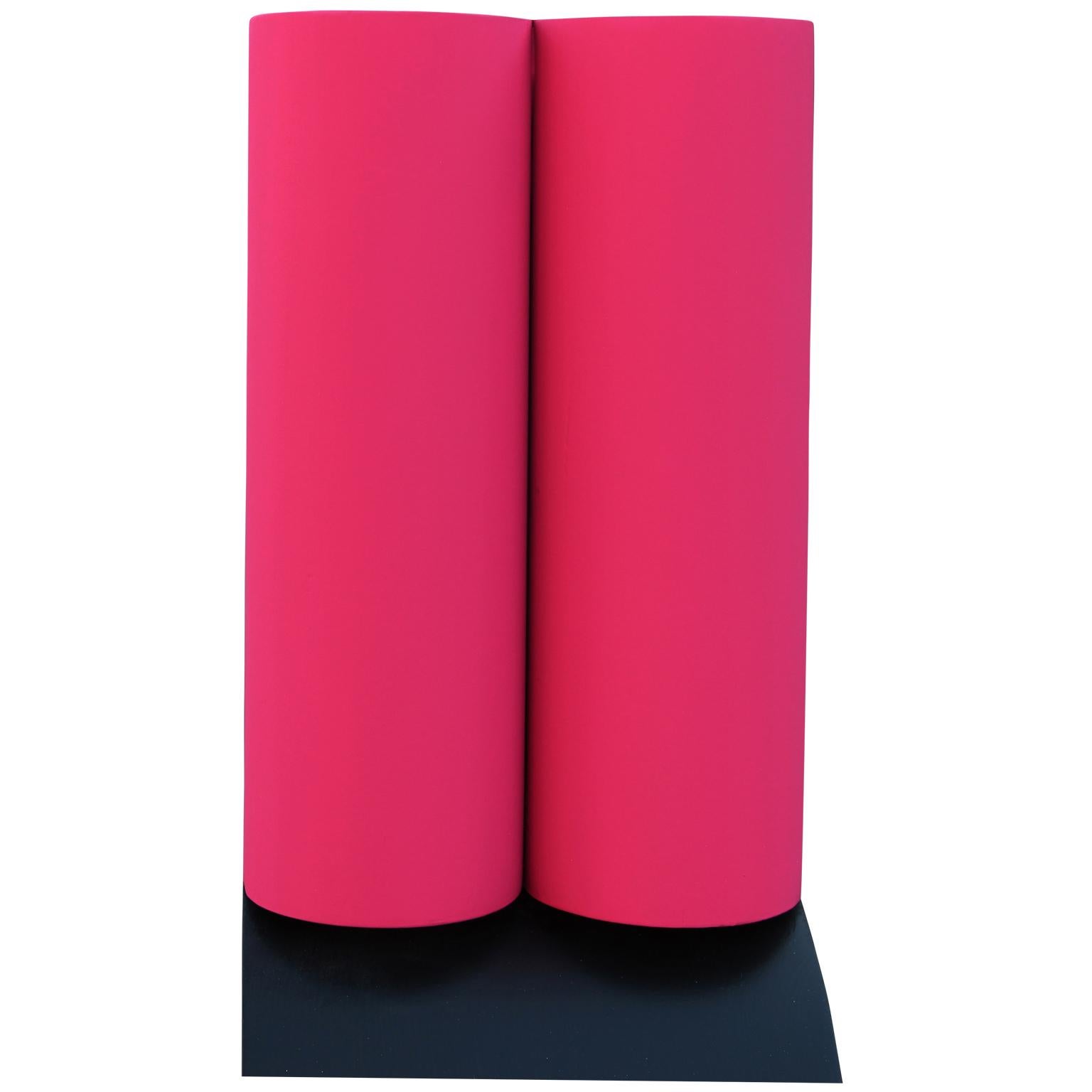 Minimalist black and neon pink organic sculpture by contemporary Houston, TX artist Matthew Reeves. Inspired by buoys commonly found along major waterways, the work features a column of black stacked half cylinders with a pink accent at the top. The