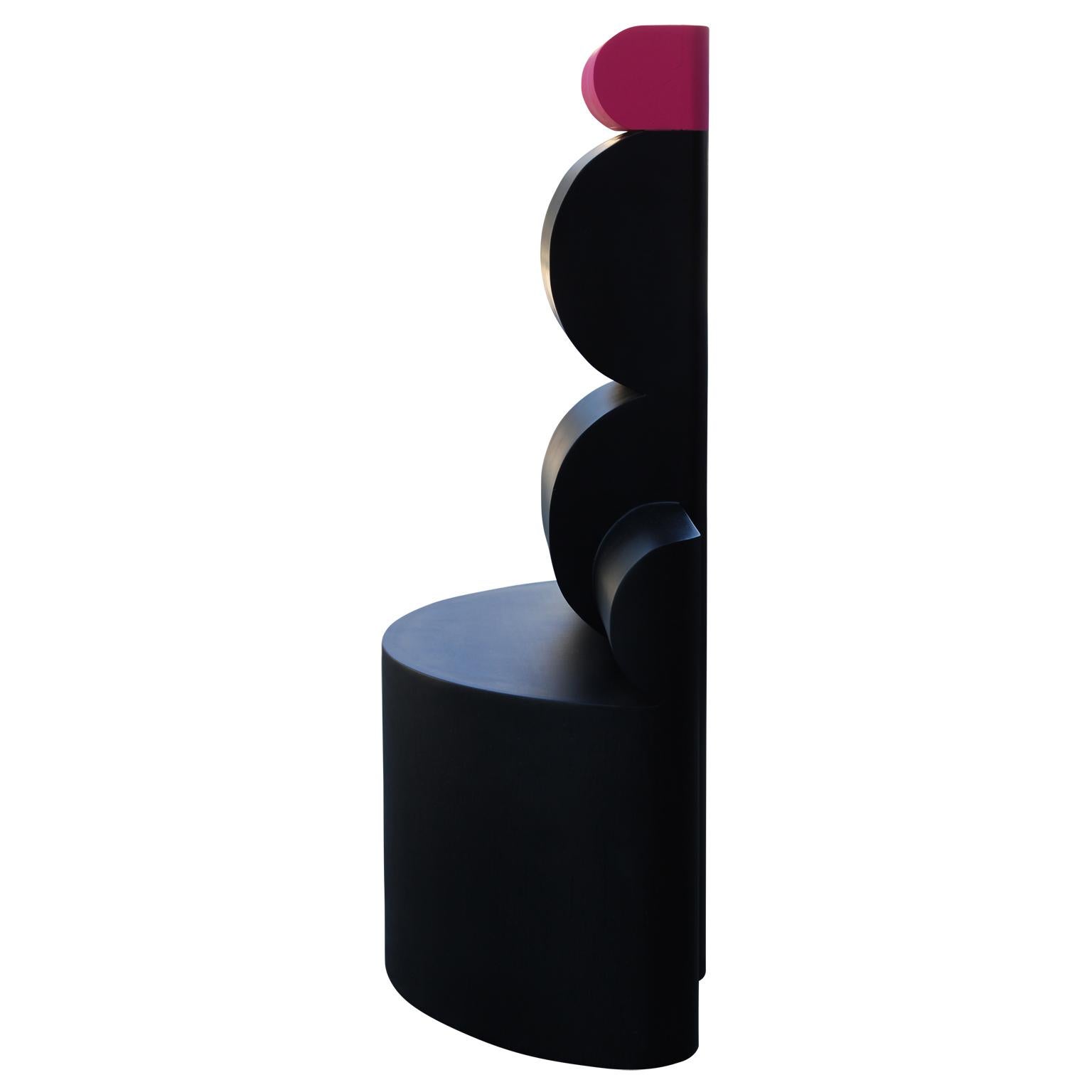 Minimalist black and neon pink organic sculpture by contemporary Houston, TX artist Matthew Reeves. Inspired by buoys commonly found along major waterways, the work features a column of black stacked half cylinders with a pink accent at the top. The