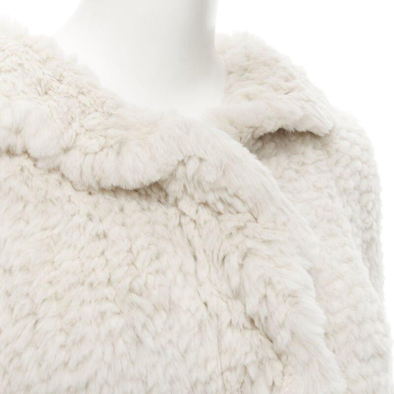 MATTHEW WILLIAMSON beige rabbit fur ruffle collar 3/4 sleeve short jacket UK8 XS
Reference: CELG/A00074
Brand: Matthew Williamson
Material: Fur
Color: Beige
Pattern: Solid
Closure: Hook & Eye
Extra Details: Draped collar. Hook eye