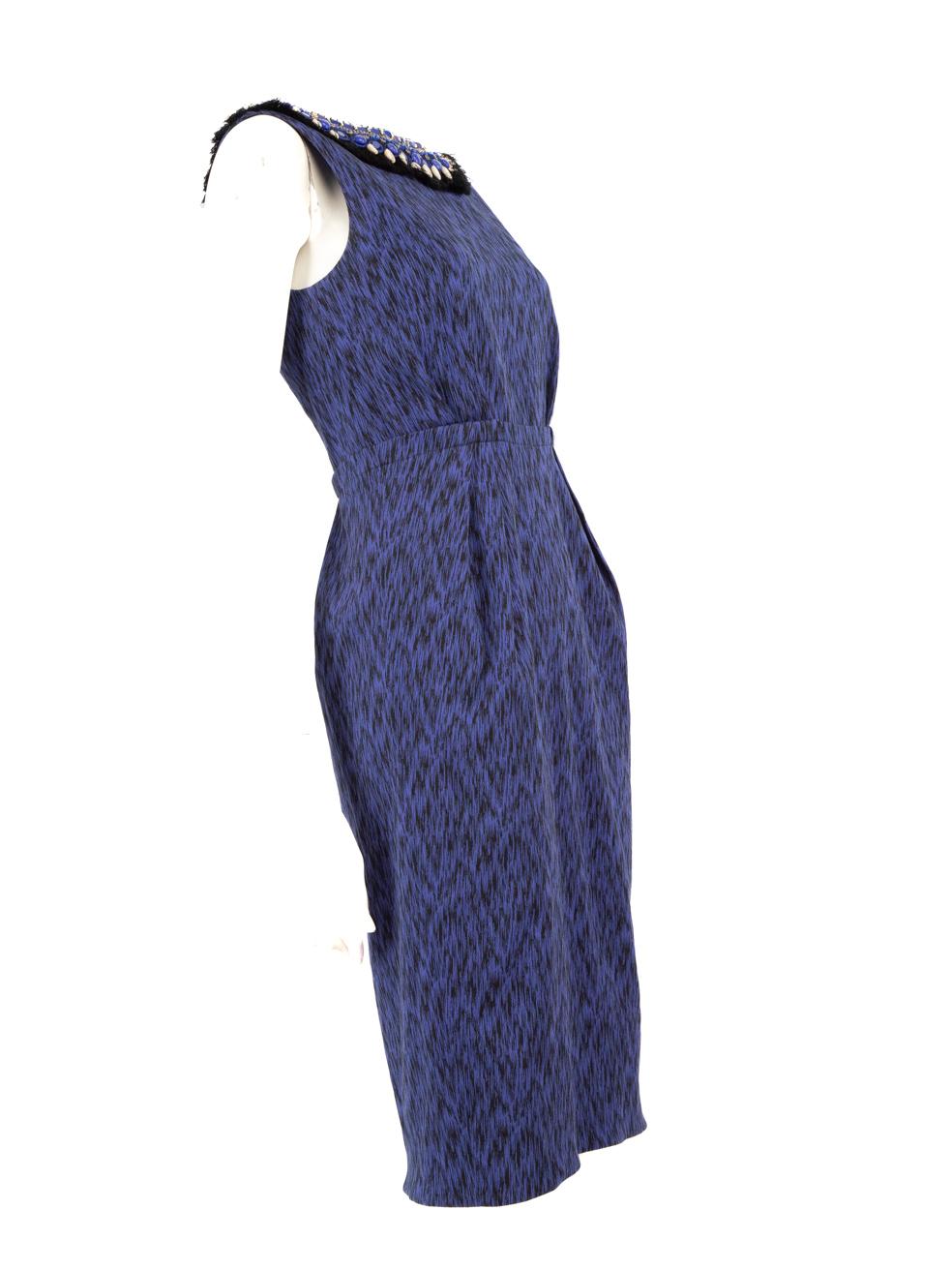 CONDITION is Good. Minor wear to dress is evident. Some shells and blue beads are missing around the neckline area and there is some discolouration to the front on this used Matthew Williamson designer resale item. Discolouration may need gentle