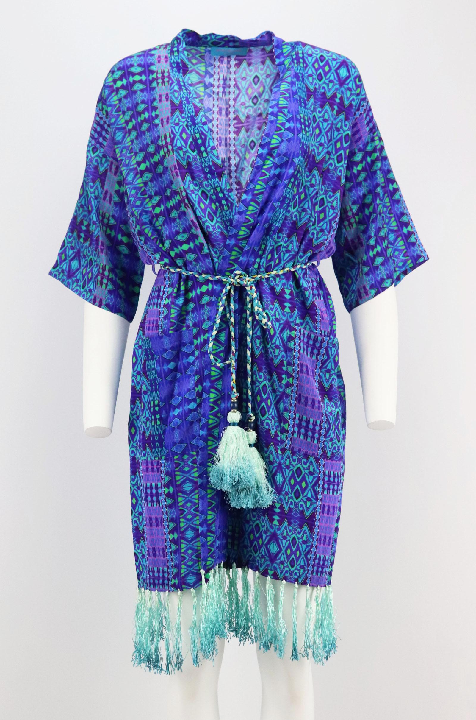 Matthew Williamson Escape coverups are vibrant and playful, cut from silk, this robe is alive with geometric motifs and has tassels hanging from the tie belt.
Multicoloured silk.
Belt fastening at front.
100% Silk.

Size: UK 8 (US 4, FR 36, IT