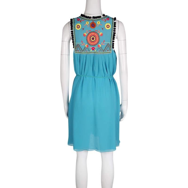 This dress from Matthew Williamson is as delighting as it is gorgeous and stylish. Made from silk, the dress flaunts floral embroidery and little pom poms on the yoke and a tie at the waist. Designed to perfection, this escape blue dress will look