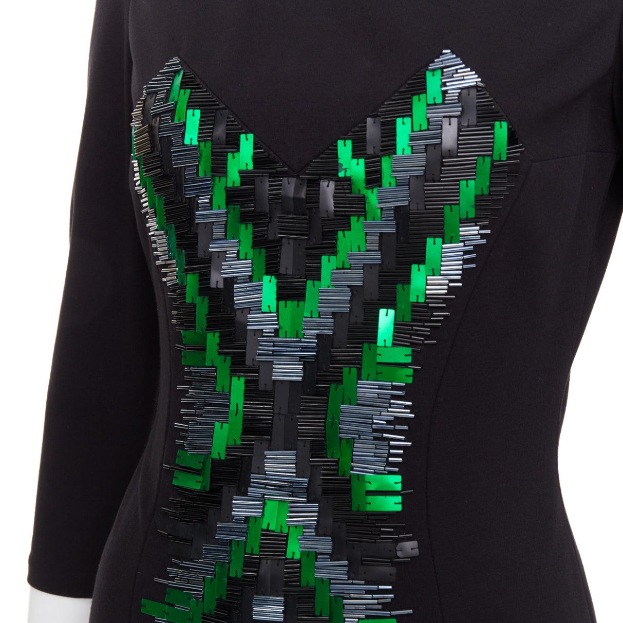 MATTHEW WILLIAMSON green black rectangular sequin embellished illusion dress UK10 M
Reference: CC/A00483
Brand: Matthew Williamson
Material: Viscose, Blend
Color: Black, Green
Pattern: Solid
Closure: Zip
Lining: Black Fabric
Extra Details: Zips at