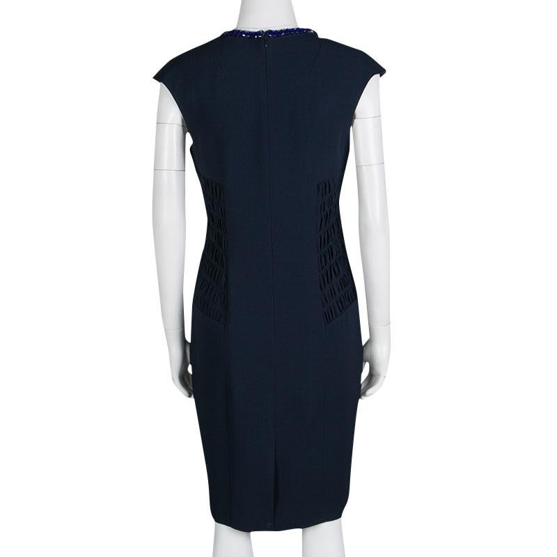 When you feel like looking fantastic, pick this dress from Matthew Williamson. This sleeveless outfit exudes modernity and elegance with its beautifully embellished neck and interesting smocked detail on the sides. Equally flattering, the dress is
