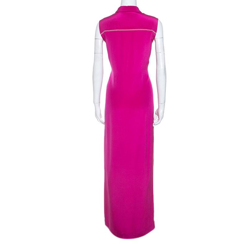 Choose this fabulous dress from Matthew Williamson for an upcoming event. The pink creation is made of a 100% silk and features a fitted silhouette. It flaunts a belt detail and a collar. This dress is sure to lend you a great fit.

