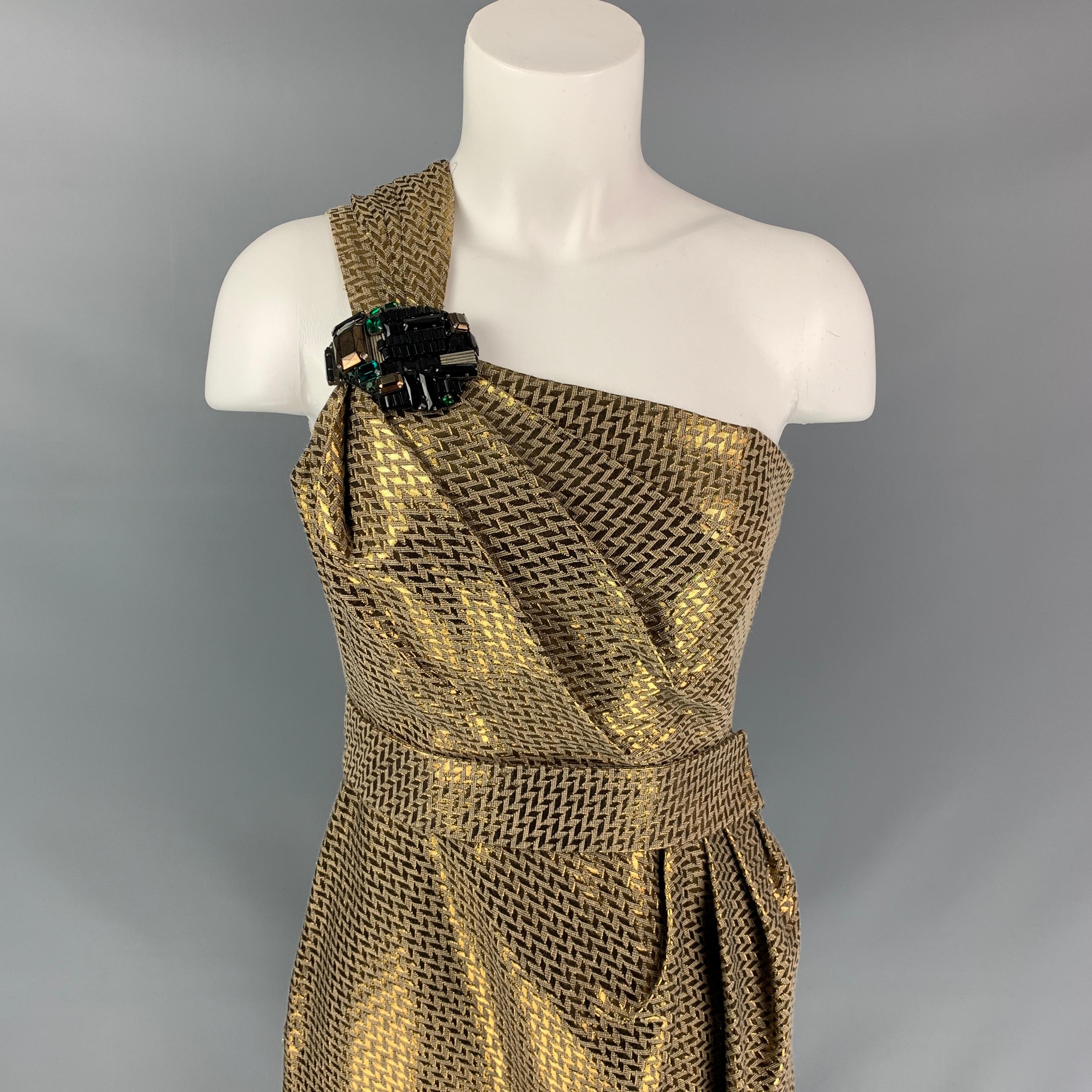 MATTHEW WILLAMSON dress comes in a gold metallic cotton blend featuring a one shoulder style, crystal embellished detail, belt strap, layered, and a zipper closure. 

Very Good Pre-Owned Condition.
Marked: 8

Measurements:

Bust: 28 in.
Waist: 24