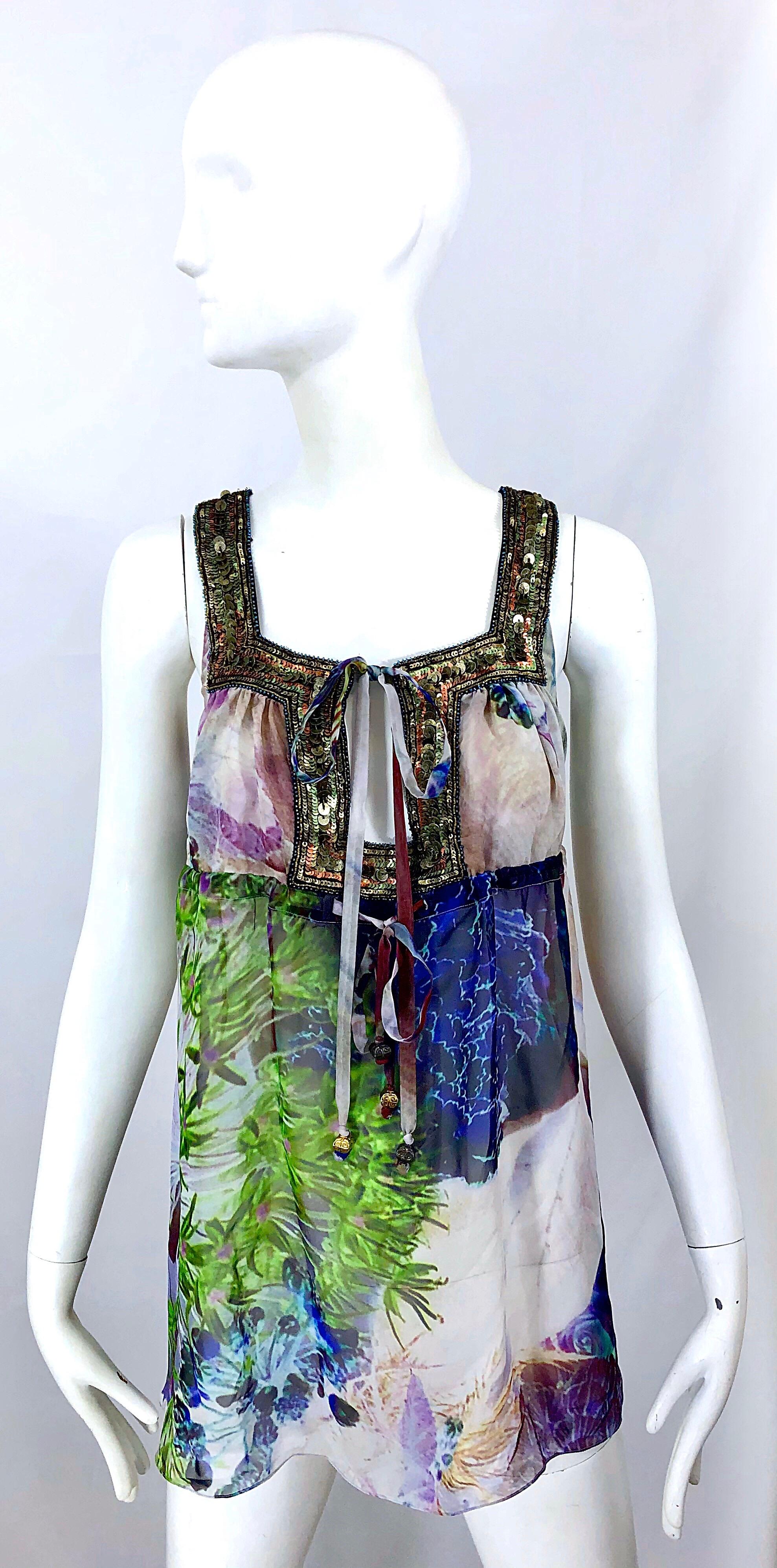 Chic early 2000s MATTHEW WILLIAMSON geography print chiffon sequined empire waist sleeveless blouse! Features prints of leaves, clouds, the ocean, etc. throughout. Vibrant colors of blue, green, lilac, purple, and pink. Rose gold and bronze sequins