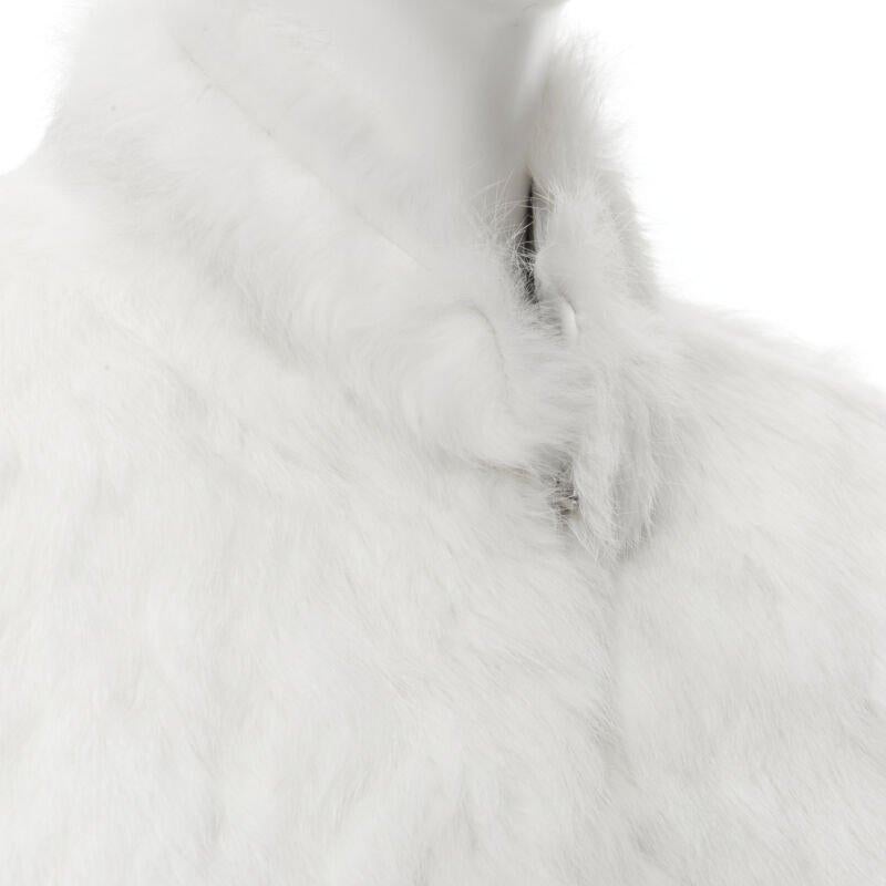 MATTHEW WILLIAMSON white natural fur 3/4 sleeve cropped jacket UK8 S
Reference: CELG/A00075
Brand: Matthew Williamson
Material: Fur
Color: White
Pattern: Solid
Closure: Hook & Eye
Lining:  Leather
Extra Details: Stand collar. Hook eye