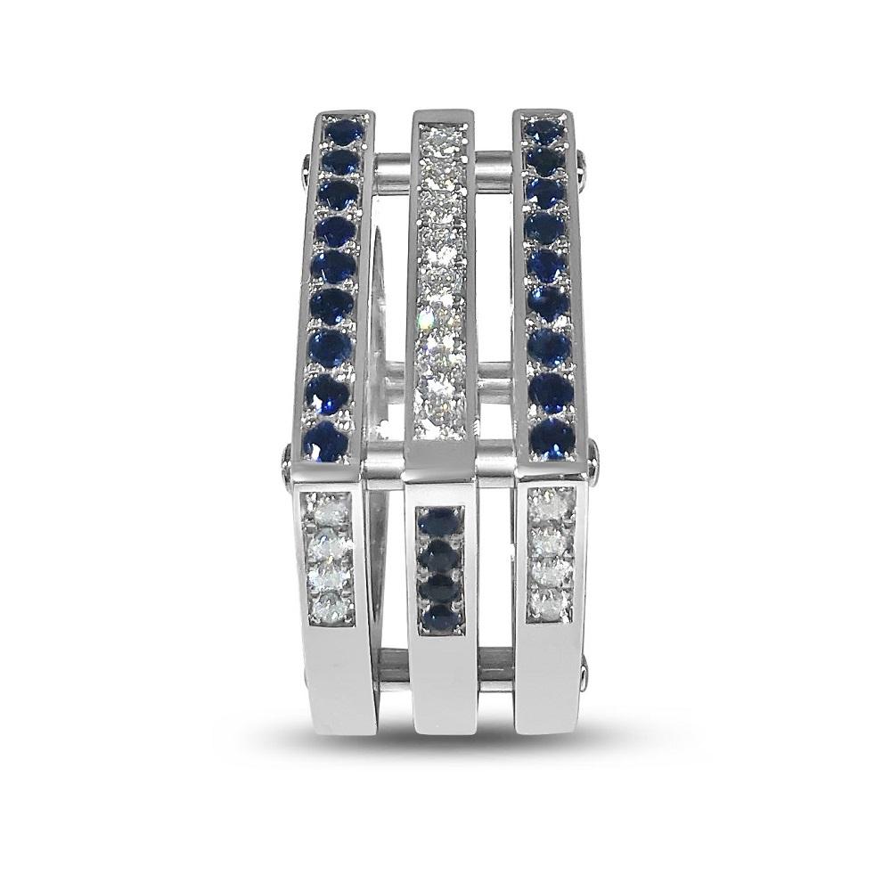 Matthia's & Claire Cube Collection Triple Cube Ring WG with Diamonds and Blue Sapphires

18k white gold Triple Cube Ring with diamonds. Strong and structured, our Cube collection boasts modern lines and polished angularity, accented by diamonds and