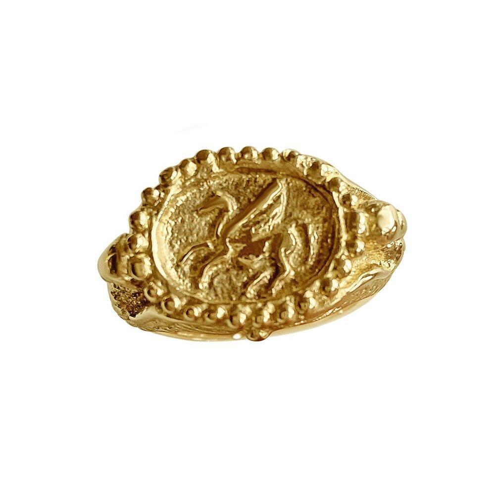 Matthia's & Claire 18k Yellow Gold Signet Ring Bearing The Crest Of A Mystical Pegasus

The Etruscans are recognized around the world for the mastery of their goldsmiths. Since the founding of their society, the Etruscan civilization has specialized