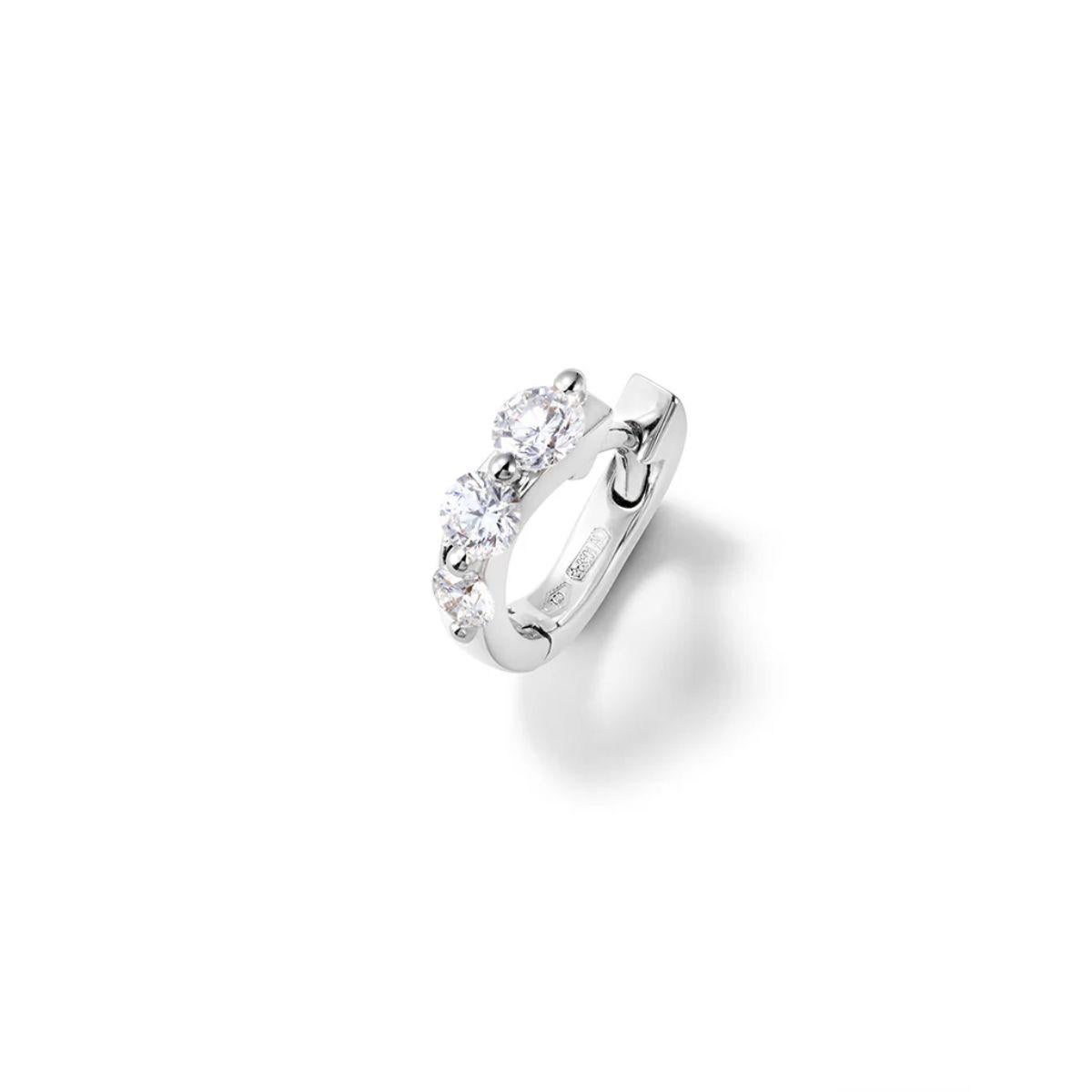 Orecchino mono in oro bianco 18k e diamanti bianchi da 0,27 ct. Tempo di produzione 4-5 settimane

COLLEZIONE ASPIS
I movimenti ipnotici di un serpente che striscia sulla sabbia sono magistralmente reinventati nelle catene e nei bracciali in oro 18k