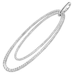 Colgante de fichas Mattioli en  Oro blanco y diamantes blancos.